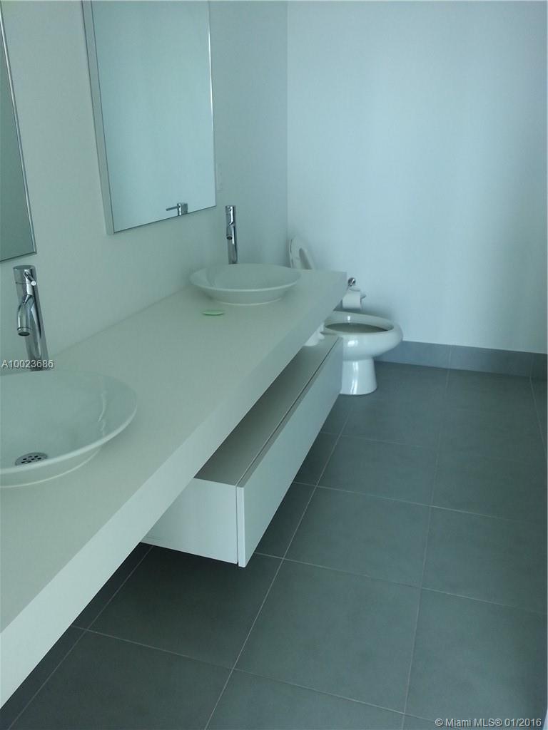 MINT CONDOMINIUM - Residential Lease