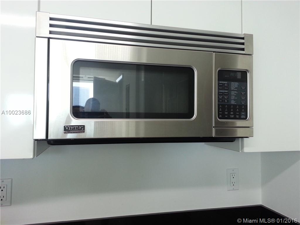 MINT CONDOMINIUM - Residential Lease
