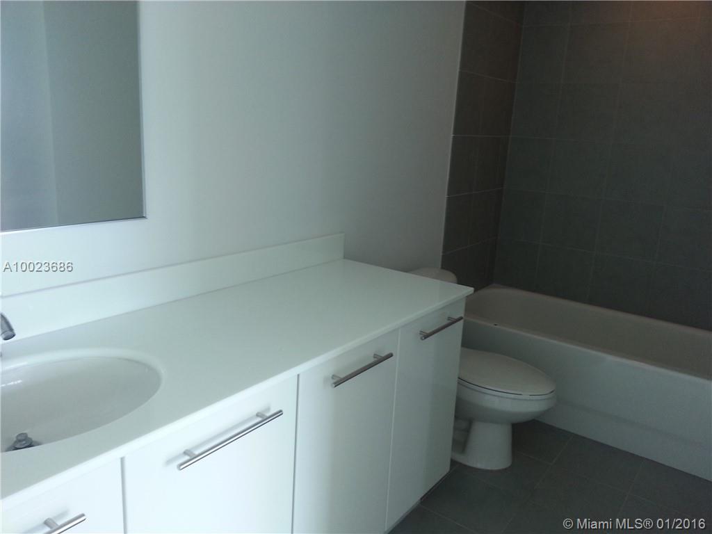 MINT CONDOMINIUM - Residential Lease
