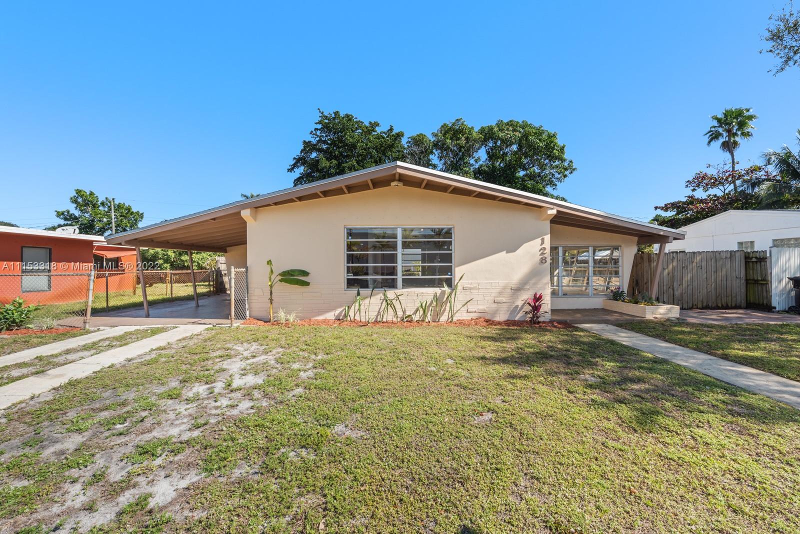 Move-In Ready, Spacious  4/1 single family home in Woodland Park.  Living room, eat-in dining and  Florida room with lots of natural light (can be used as a 4th bedroom or in home office, or playroom) provide the perfect amount of space! Covered carport with a connected utility room with washer/dryer.  Gorgeous, fenced in backyard with paved lounge area. Shaded trees and landscaping to enjoy! On site ample parking. Walking distance to Walmart and 5 miles to Las Olas & FT Lauderdale Airport.  Walking distance to Amtrak/Tri-Rail station. Tenant responsible for electricity, water/sewer & landscaping. Pets under 45lbs with a non-refundable pet deposit. This place won't last long- tour today!
