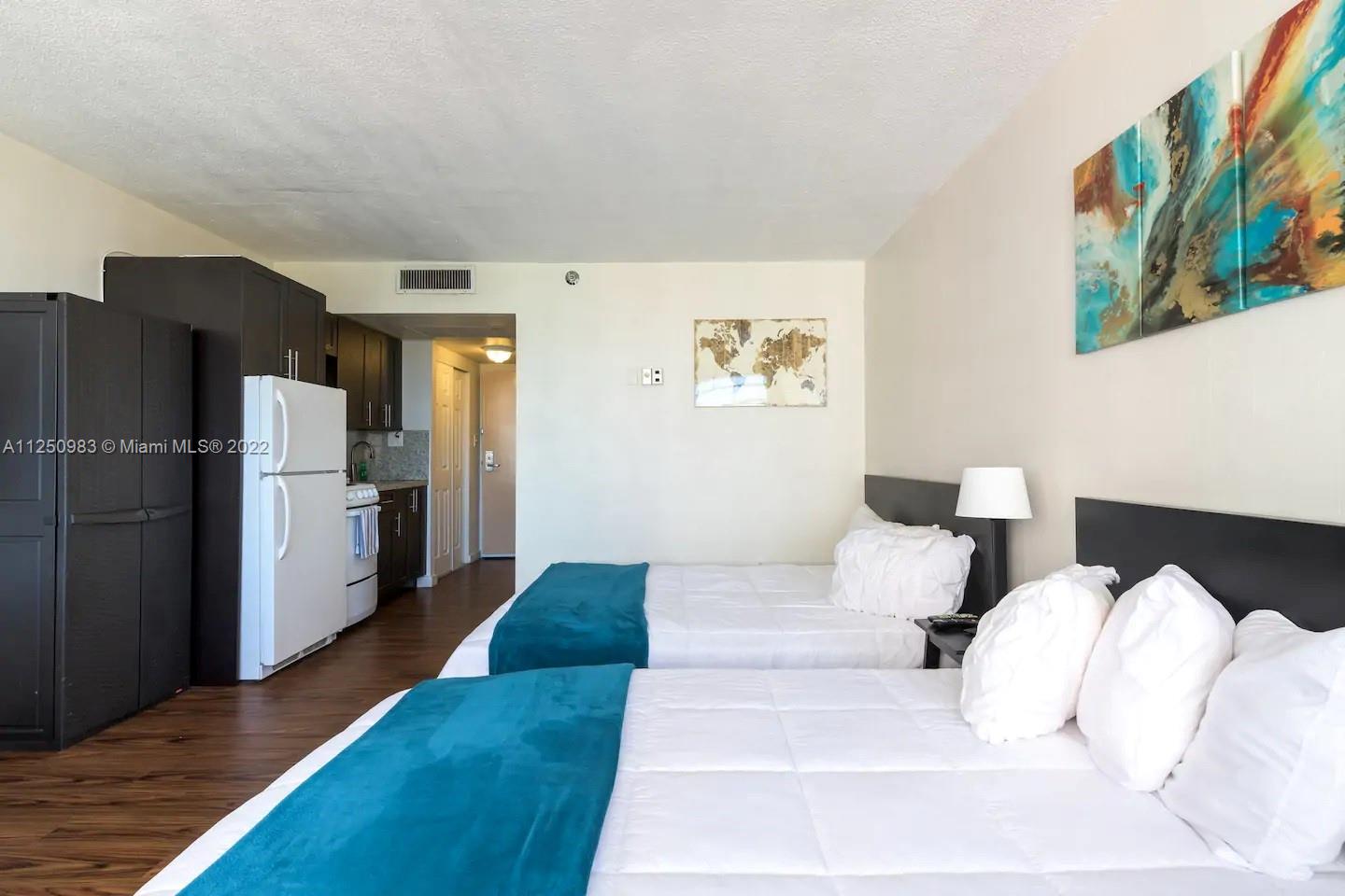 Partial ocean view from this 10th floor unit.  New hurricane impact windows installed in 2022.  Fully furnished unit, ready for use, vacation rental, Airbnb, etc.  ***NOT UNDER HOTEL PROGRAM CONTRACT***    It has 2 double queen-size beds, table with chairs, closet, 42-inch LED TV, decoration, cooking ware, linen, towels, iron, ironing board, hair dryer, kitchen utensils, and many items. Everything is included in the sale!  Very easy to show. NO SPECIAL ASSESSMENT TO BUYER, SELLER WILL PAY BALANCE IN FULL AT CLOSING.