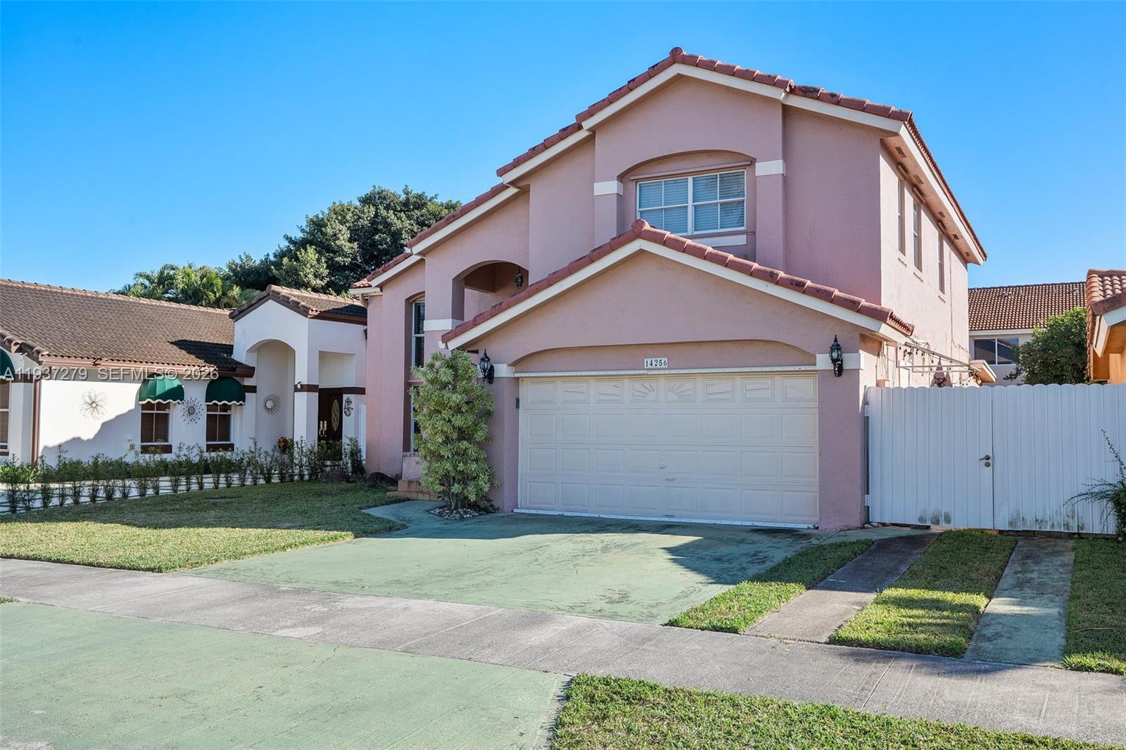 Very spacious 4-bedroom, 3.5-bathroom home in the Hammocks area with no HOA. The home features 1 bedroom and 1.5 bathrooms downstairs, making it an ideal layout for an in-law's quarters or a potential income-producing space. The living area features high ceilings, a sunken living room, and lots of natural light. The kitchen has granite countertops and updated cabinets with stainless steel appliances and a tankless water heater.  Large master suite upstairs with an en-suite bath and jetted tub, and lots of natural light. With Publix, Target, Walmart, parks, and plenty of restaurants just minutes away. The home needs some updating and repairs; the roof is original, and the flooring upstairs needs to be replaced, along with the 2nd HVAC upstairs. There is considerable potential to make this home your new oasis by adding your personal touches.