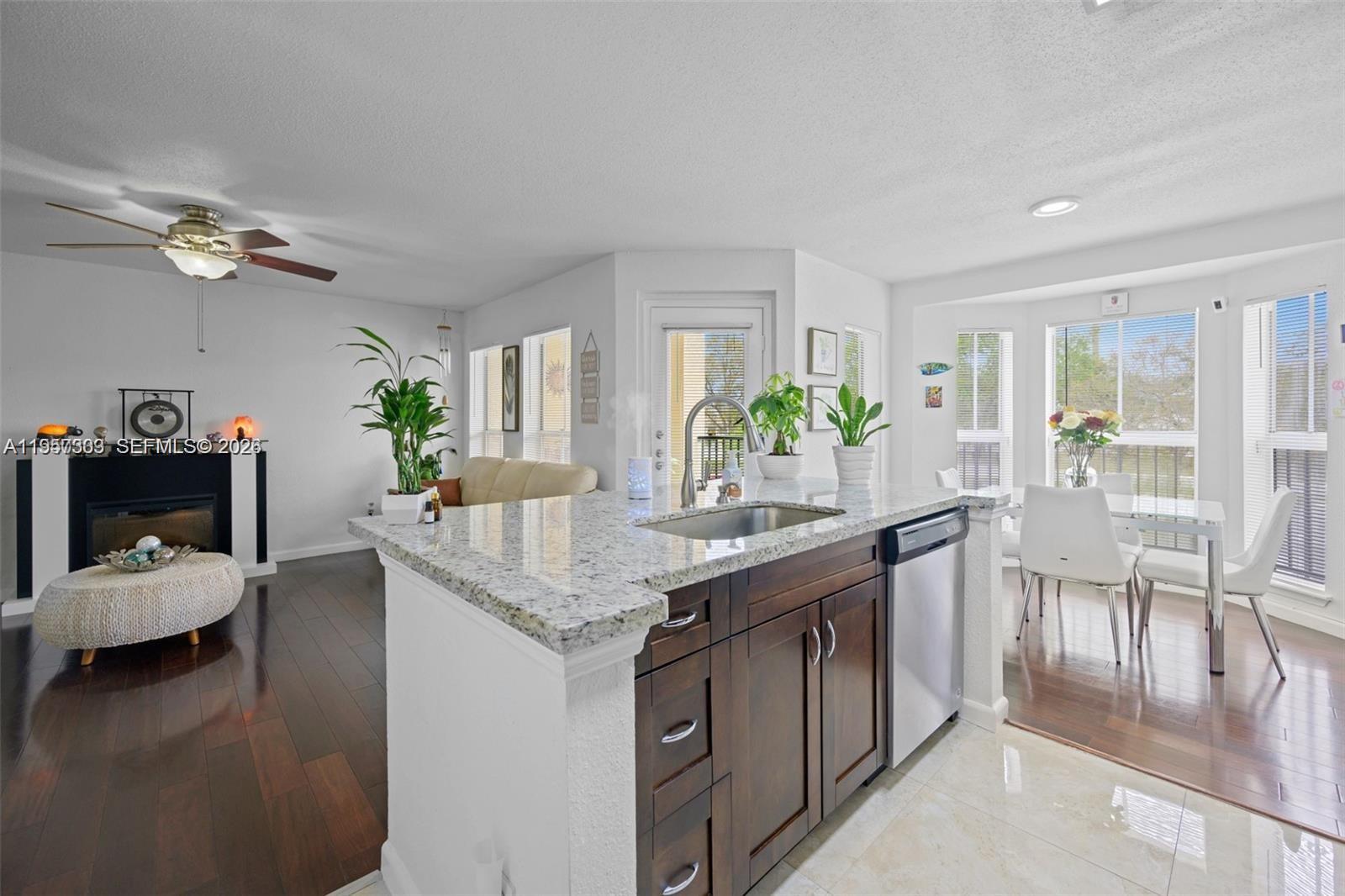 Very spacious and bright 1 bed / 1 bath condo located in the desirable Savannah at Riverside community in Coral Springs. This unit features soaring vaulted ceilings, tile and laminate flooring throughout, a new washer and dryer inside the unit, and an updated kitchen with granite countertops and a beautiful center island. Enjoy resort-style amenities, including a swimming pool and fitness center. Conveniently located directly across from Coral Springs Mall and close to the post office, major roads, movie theater, dining, and more. Vacant and easy to show. Excellent opportunity for first-time homebuyers or investors.