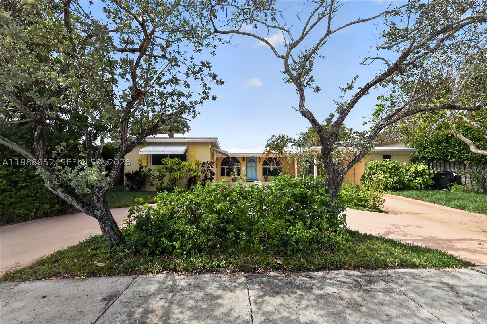 FLORIDA RIVERFRONT GEM on Mandarin Isle only minutes from downtown w/direct access to the ocean & no fixed bridges. Circular drive with tree island, carport and shed on a one entrance Isle.. Larger street frontage of 90 feet. Established gardens of flowers, orchids and fruit on all sides of this expanded home with rare Palladian windows. Home was deepened w/ the expansion of all rooms facing the river and a step down to the third BR or den. Living room is expanded with family-room, dining area and open to kitchen. Sliding glass doors in all rooms facing the river & huge amounts of natural light w/ large windows in all exterior rooms. Plenty of boat storage and full property width dock on the wide Bluefish Canal. Citrus Isles have been rapidly increasing in value. NO HOA.