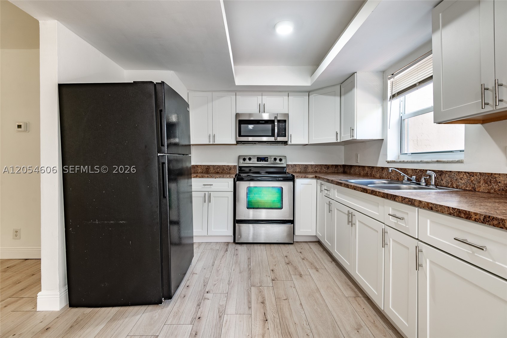 TAM OSHANTER GARDENS FAMI - Residential Lease