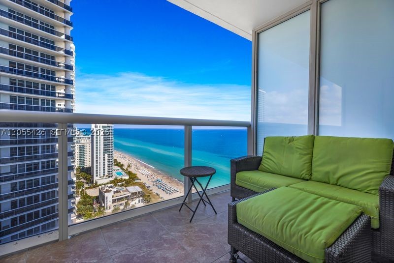 Beautifully renovated Studio + Den with breathtaking ocean views in the prestigious Beach Club. Offered fully furnished and move-in/rental ready. The spacious living area features two pull-out Murphy beds, maximizing guest capacity and rental potential. Investor-friendly with excellent income potential. Enjoy resort-style amenities including multiple oceanfront pools, private beach service, a 50,000+ sq. ft. two-story fitness center, luxury spa, valet, concierge, and 24-hour security. Prime beachfront location close to Aventura Mall, Gulfstream Park, fine dining, and both Fort Lauderdale and Miami airports.