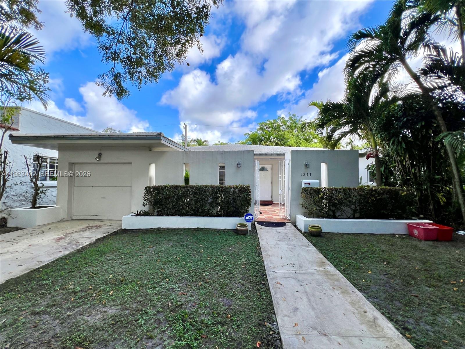 Located on a beautiful tree lined street in one of Coral Gables’ most charming neighborhoods, this 3 bedroom, 3 bath residence offers a rare opportunity to create your dream home just minutes from downtown Coral Gables. The home is in comfortable living condition with solid bones and a functional layout, providing the perfect canvas for a buyer to update and make it their own. Features include a durable tile roof installed in 2009 and a location in Flood Zone X. Set on a quiet, low-traffic street surrounded by mature trees and classic Gables architecture, this property combines timeless character, an exceptional location, and tremendous upside potential.