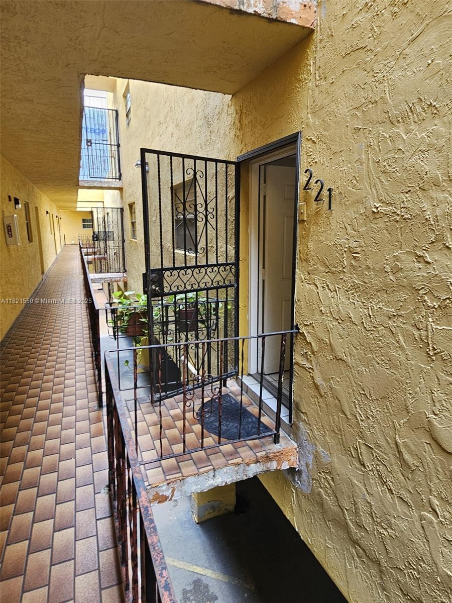 Fantastic location, minutes from the Palmetto Expressway, two minutes away from Westland Mall Shopping Center, Home Depot, and within walking distance of many other stores.  Very nice and quiet neighborhood.  Tiled through, featuring a double balcony with lots of light, washer & dryer hookup inside unit.  Gated community, pool, domino recreational area, and party/event salon.  EASY TO SHOW!!.  AVAILABLE JULY 1st.  Only 2/1 Unit in the building with 2 covered tandem-type car parking spaces.