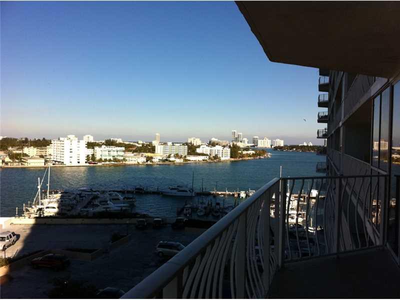 Spectacular 2 bedrooms 2 baths split floor plan with beautiful bay and city views. Located in a waterfront building with marine. Unit has laminate floors, and an assigned covered parking space. Large balcony and floor to ceiling windows to maximize the vi ews. Access to the balcony from every room. Furnished or unfurnished.