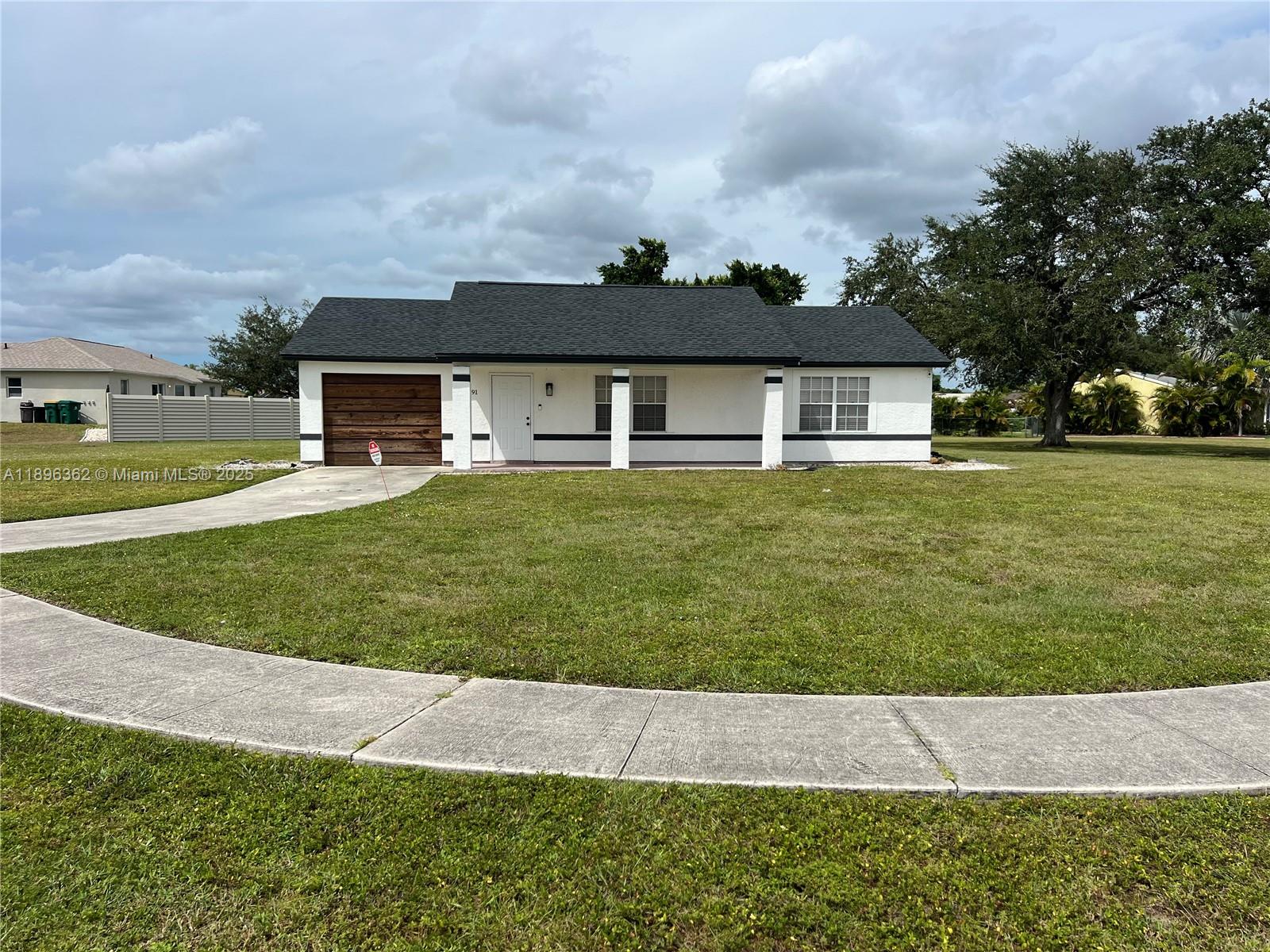 Beautiful Corner Home Huge Lot 2/2 with New Kitchen and roof Don’t miss it