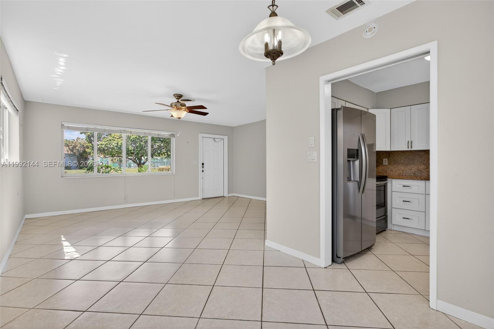 HUGE price improvement for Fast Sale !! Cap rate almost 6% Potential ! BEST priced Duplex in Lighthouse point!   Don't waste time on this one! RARE opportunity in prime LOCATION LOCATION * LOCATION in Lighthouse Point. This 2 Bedroom plus Den property sits on a 10,828 SF LOT zoned RD-10 with an existing duplex totaling 2,584 SF, offering strong potential for renovation, income production, or luxury duplex redevelopment, Zoning in area allows up to 33ft tall, No HOA and no rental restrictions, providing flexibility. Build new in a highly desirable location or live in one unit and rent the other. The property offers a fenced backyard, private laundry room, circular 2-car parking, and impact windows. Conveniently located close to beaches, marinas, shopping, and dining. Photos are from the south unit; the north unit has similar layout with carpeted rooms. Property being sold AS-IS.  Lighthouse Point is one of South Florida’s most desirable residential communities. Buyer to verify all information. including lot size, zoning, and duplex layout.