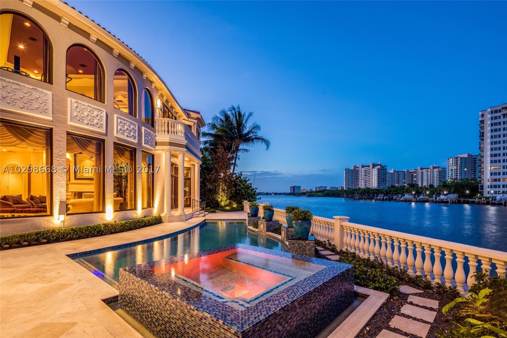 The Ultimate Intracoastal Dream Estate located in the Heart of Boca Raton. Built in 2002, this Tuscan Inspired Villa is situated on a rare oversized SE Point lot boasting 233 FT of Water Frontage. 6 BD/ 8.5 BA featuring nearly 9,000 SF of Interior Living Space, this Estate includes the best of Modern Day amenities such as High Volume Coffered Ceilings, Crown Moldings, Grand Foyer, Imported Marble & Stone, Custom Mill Work, Elevator, Upstairs & Downstairs Laundry, Cinema, 4 Car Garage, Pool/Spa, and more.