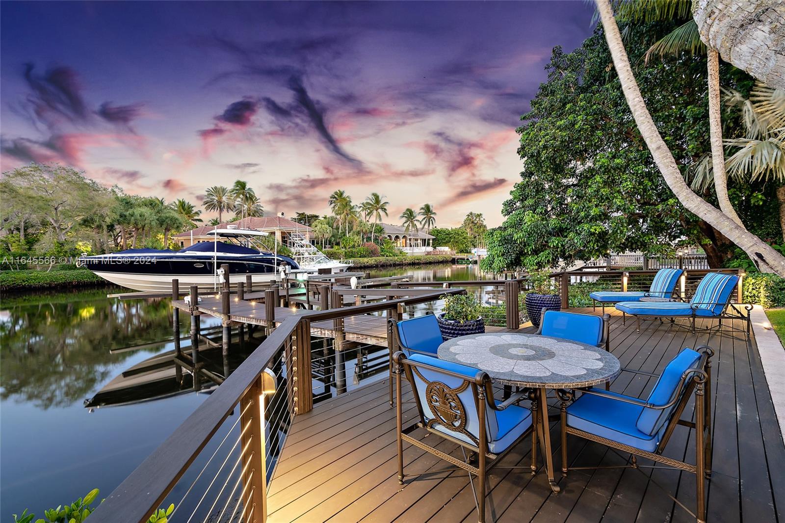 Step into this elegant, timeless, and ultra-private waterfront estate, a masterpiece of design and luxury. Completely reimagined in 2007, this residence is perfect for both indoor and outdoor entertaining. The estate features 5 spacious bedrooms and 6.2 luxurious baths, offering the ultimate in comfort and style. As you pass through the wrought iron gate, you're welcomed into a sophisticated, resort-style oasis. The pool and patio area, designed for relaxation, are surrounded by serene sights and sounds that make everyday living feel like a retreat. Inside, custom details abound, from the updated kitchen, which opens to the family room, to the chef's dream appliances, including a large gas range, double refrigerator/freezer, and a butler's pantry complete with