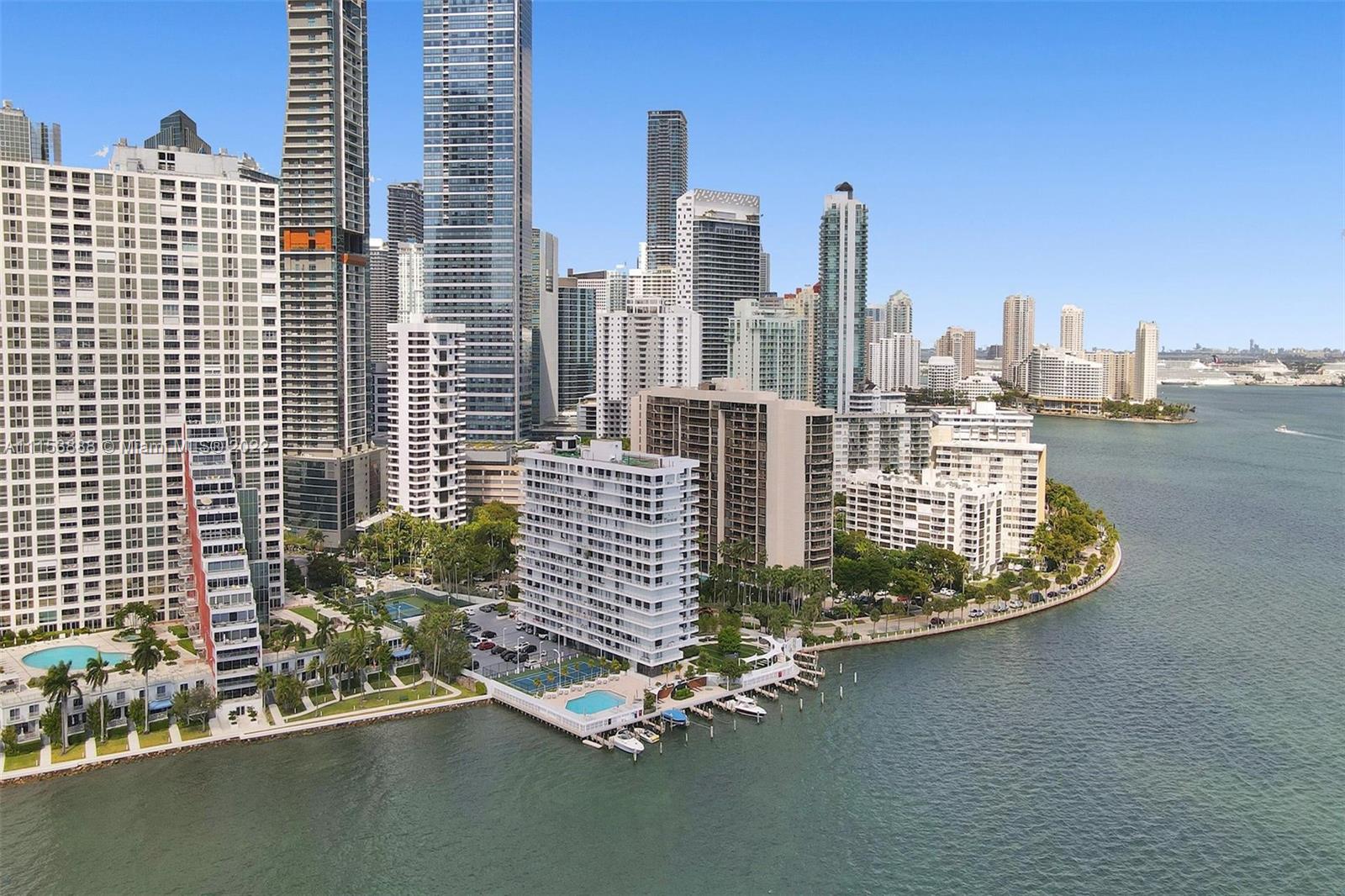 Live in the best boutique building on Brickell! 2/2 unit with unobstructed Biscayne Bay and Key Biscayne views from waterfront building. Interior has marble floors, custom kitchen with built-in appliances & floor -to-ceiling glass doors, 1 parking space and hurricane shutters. Just one block from Brickell Ave. - walk to trendy restaurants and shops at Mary Brickell Village.