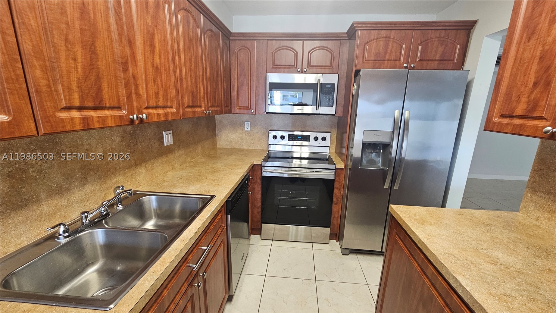 Back on the market with a fresh price reduction! Don’t miss this cash-only opportunity to own a well-located condo with excellent potential. Featuring a bright layout, functional design, and access to desirable community amenities, this unit is perfect for investors, downsizers, or anyone looking for a smart real estate opportunity.

First floor unit located in the private community of Miller Gardens. This is the split model with 2 bedrooms and 2 full bathrooms. Each bedroom has a walking closet; master bath has a big shower with 2 vanities; second bedroom has an extra wall closet for more storage. Kitchen fully equipped with stainless steel appliances. Washer & dryer. Rheem A/C. Freshly painted, new roller shades, crown moldings, hurricane shutters; 2 assigned parking spaces located near the entrance. Miller Gardens is a gated community with 24hrs guards for your safety. There is a monthly special assessment of $217.28