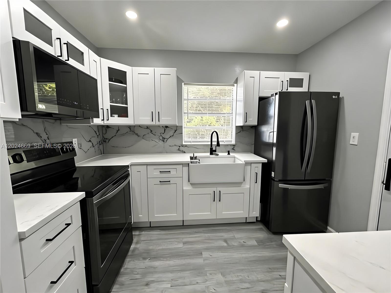 Beautifully renovated 3-bedroom, 1.5-bath smart home conveniently located near Downtown Fort Lauderdale. This move-in ready property features a completely updated interior with new flooring throughout, a modern kitchen with updated appliances, and renovated bathrooms. Enjoy a spacious front lawn with plenty of outdoor potential, plus a shed for additional storage. Conveniently located near shopping, dining, entertainment, and major highways. A great opportunity to enjoy comfort, style, and smart home living in a central location.