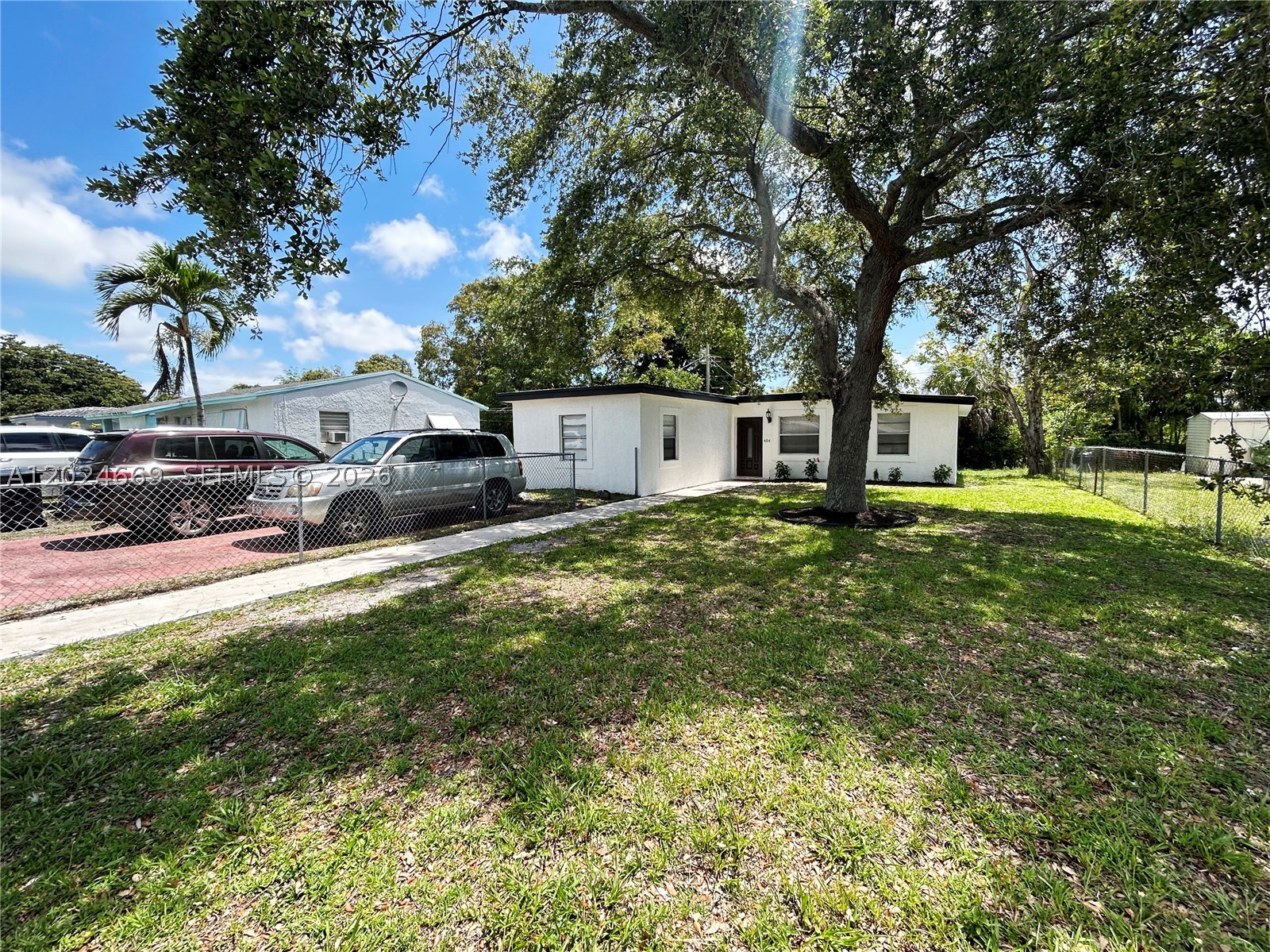 Beautifully renovated 3-bedroom, 1.5-bath smart home conveniently located near Downtown Fort Lauderdale. This move-in ready property features a completely updated interior with new flooring throughout, a modern kitchen with updated appliances, and renovated bathrooms. Enjoy a spacious front lawn with plenty of outdoor potential, plus a shed for additional storage. Conveniently located near shopping, dining, entertainment, and major highways. A great opportunity to enjoy comfort, style, and smart home living in a central location.