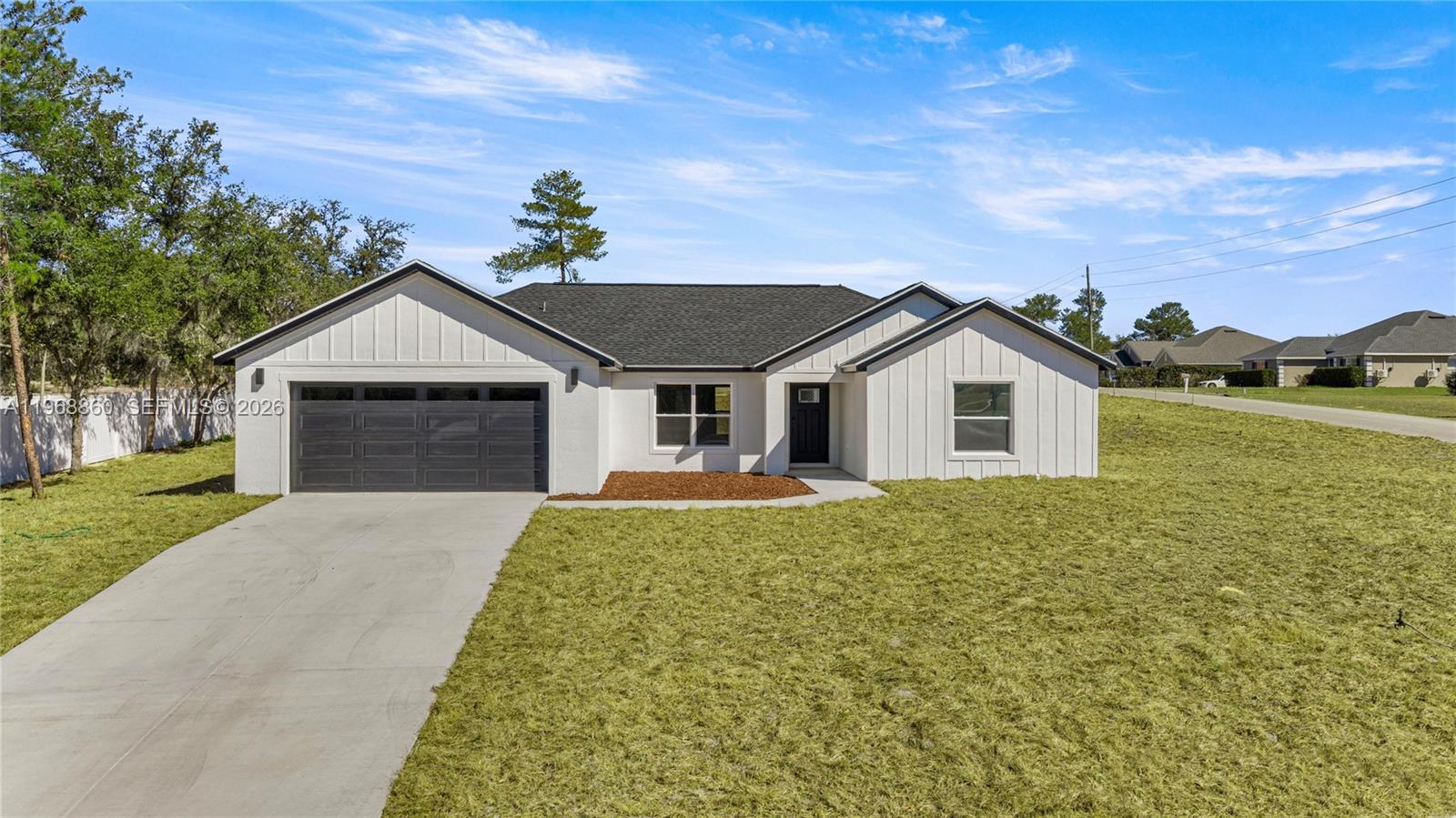 Welcome to this 2026 new construction home in Ocala, Florida, featuring 4 bedrooms, 2 bathrooms, and a bright open-concept layout designed for farm house-modern living. Situated on a rare corner lot just under half an acre, this property offers space, privacy, and flexibility that is increasingly hard to find in Ocala’s growing market. The expansive lot provides room for a future pool, outdoor living area, garden, or RV/boat parking—an advantage over typical subdivision homes.

Inside, natural light fills the living, dining, and kitchen areas, creating a seamless flow ideal for both entertaining and everyday living. The kitchen offers ample cabinetry and workspace, while the private primary suite features a well-appointed bathroom and generous closet space. Three additional bedrooms offer flexibility for guests, office space, or a growing household.
Located in a developing area of Marion County, this move-in ready home combines quality craftsmanship, energy efficiency, and the benefits of new construction. Enjoy a prime location just 3.2 miles from the Florida Trail, 11 miles to Downtown Ocala, 12.5 miles to World Equestrian Center, and 7 miles to I-75.

2-10 builder warranty included. Preferred lender offers up to 2% toward closing costs or rate buy-down. Buyer may choose any lender.