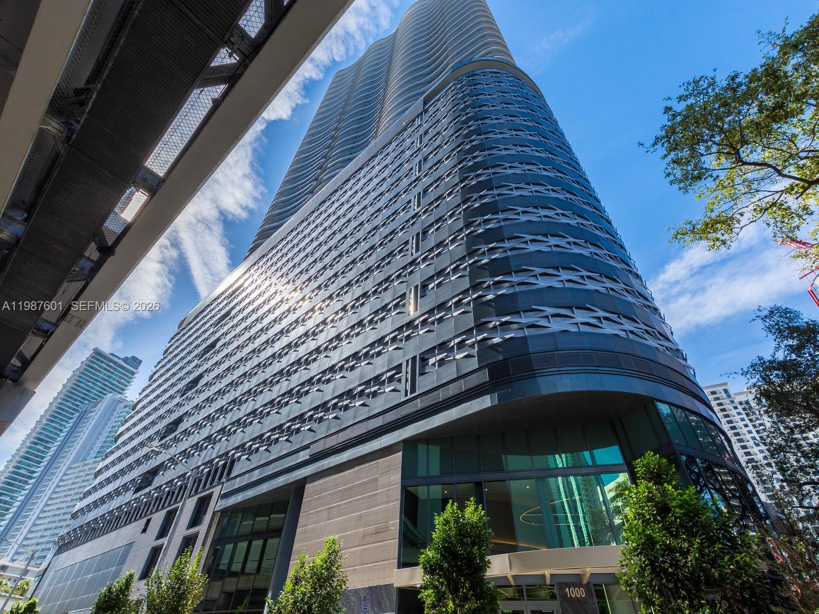 Enjoy the Brickell Lifestyle while living in Brickell's most luxurious skyscraper. 1 bed + 1 bath west facing residence on the 41st floor with spacious terrace offering sunset views. Residence features include floor to ceiling sliding glass doors. Italian Snaidero kitchen cabinetry and Miele appliances. Nest thermometer and keyless entry system. Porcelain flooring throughout with residence marble in master bath. Three levels of amenities: Sky club on 64th floor with panoramic high-performance fitness studio, spa, and massage rooms. Sky pool with mesmerizing east/west, bay and city views. 17th/18th floor cinema, kids' playroom, billiards/clubroom, kids pool, lap pool, 24/7 concierge/valet/security
