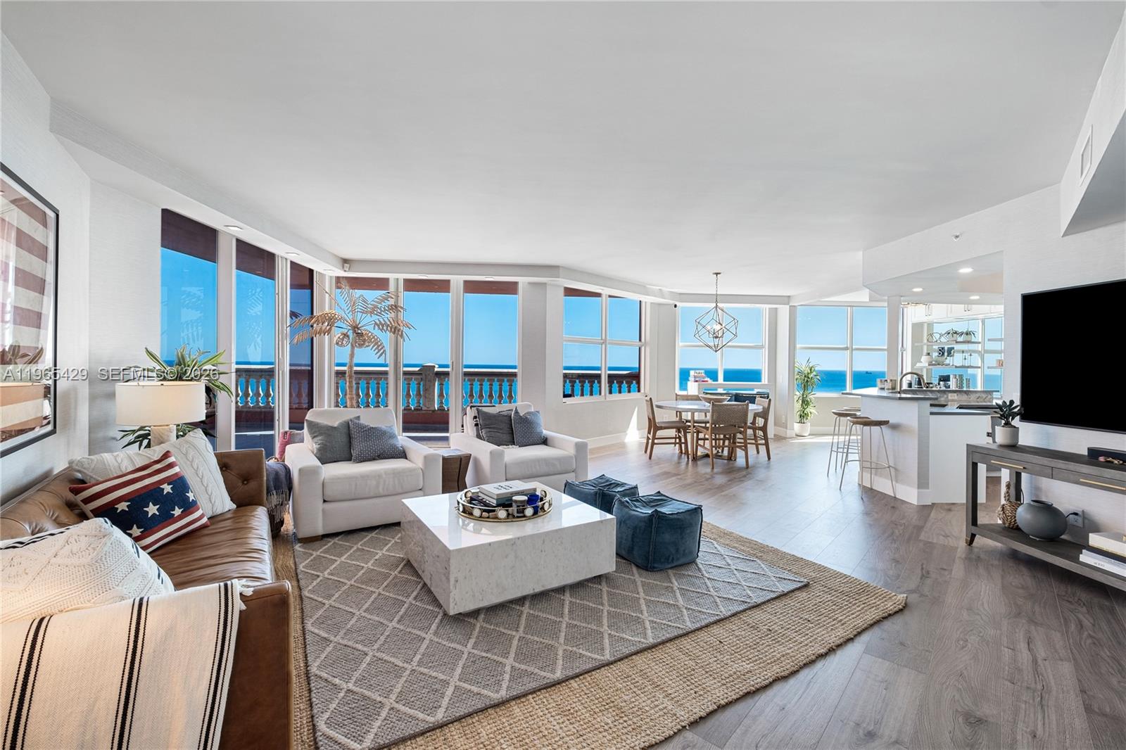 Come see this beautifully customized 3-bedroom, 2.5-bathroom at The Palms offering elevated coastal luxury with sweeping views of the Atlantic Ocean, Intracoastal Waterway, and city skyline. This spacious residence features floor-to-ceiling glass that fills the home with natural
light, an open kitchen flowing into a  great room ideal for entertaining, and two expansive terraces showcasing breathtaking sunrises over the ocean and vibrant sunsets over the Intracoastal. The large primary suite is a private retreat with a spa-inspired bath and walk-in closet.
Residents enjoy resort-style amenities including a heated pool, full beach chair and towel service, fitness center, tennis, squash and racquetball courts, Club Room, two assigned parking spaces, and 24-hour valet within a gated community that ensures privacy and security—truly living at the intersection of sea and sky.