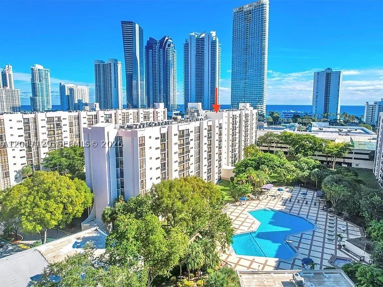 Spacious 1 bed 1.5  freshly painted unit, super bright with a breathtaking 10th floor view. Brand new ceiling lights fixture. Floor-to-ceiling windows. Remodeled kitchen, brand new dishwasher, new vanities in both of the bathrooms. Walking distance to the beach. Walk-in closet. Condo in the heart of Sunny Isles Beach. Gated community with resort style amenities: 2 tennis courts, basketball, jogging track, playground, beautiful pool area with jacuzzi, BBQ area, gym and more! Extra storage space. 24 hour security. Water, cable and internet are included in maintenance. Covered parking garage.