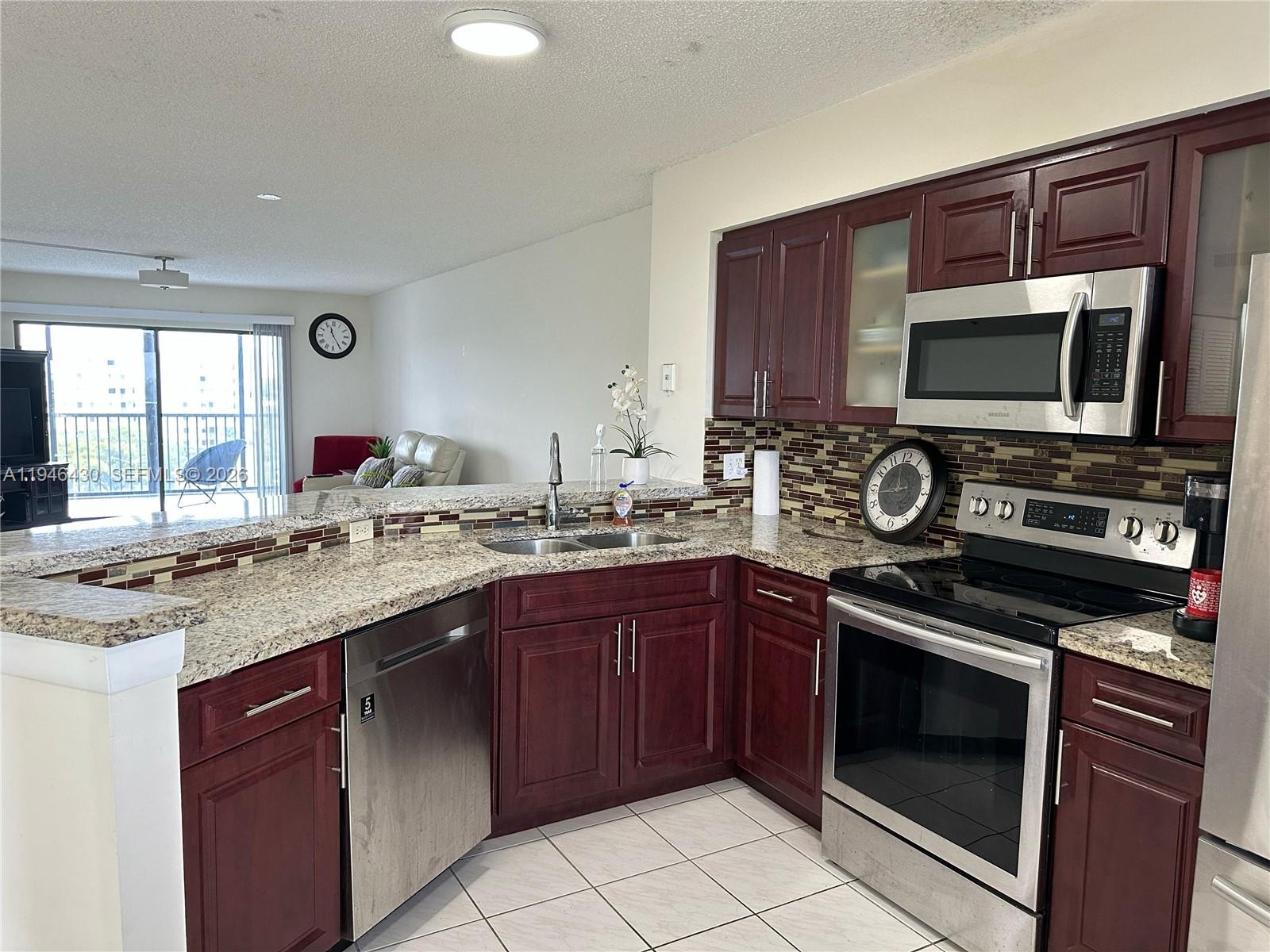 Discover this beautifully maintained 8th floor unit offering 2 bedrooms and 2 bathrooms with modern finishes throughout. The residence features impact windows for added peace of mind, abundant natural light, and a spacious open floor plan designed for comfort. The kitchen includes quartz countertops, and the convenience of an in-unit washer and dryer adds to everyday ease. Located in a well-maintained, all-ages building, this condo offers both quality and convenience in every detail. Just minutes from premier shopping, dining, entertainment, and a nearby casino, the building is in excellent condition, providing a low-maintenance lifestyle in a prime location. Ideal as a primary residence or vacation retreat.