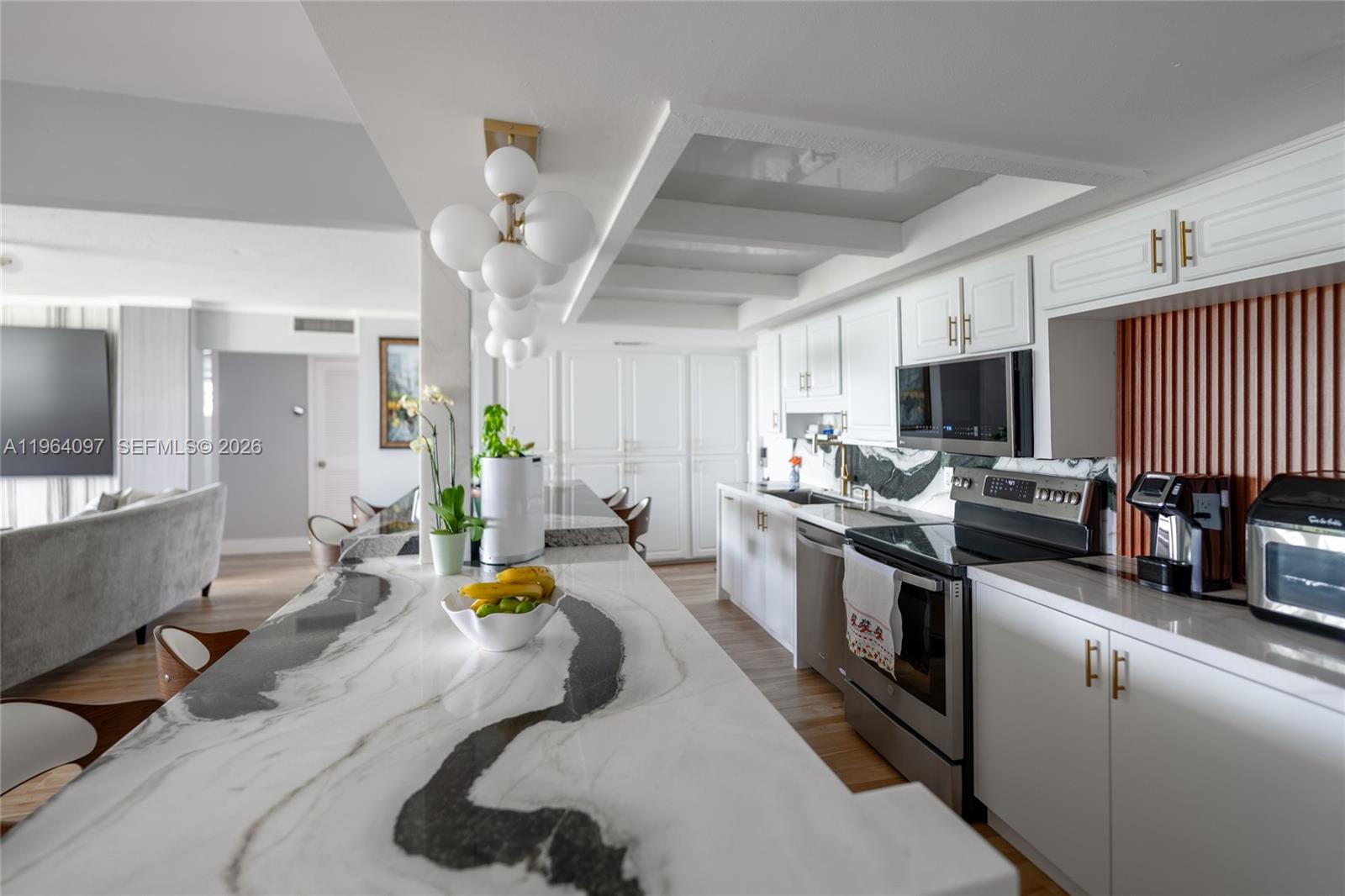 Beautiful & Rare 3-Bedroom, 2-Bath Apartment in Villa Lago Community! Don’t miss this unique opportunity to own a stunning 3-bedroom, 2-bathroom apartment in the highly desirable Villa Lago community. This remodeled unit showcases modern finishes and thoughtful upgrades throughout. The home features stainless steel appliances, ample storage space, and luxury vinyl flooring throughout the main living areas. One bedroom offers comfortable carpeting, while both bathrooms are beautifully updated with elegant tile work. This is the only unit in the community that includes a private washer and dryer, providing exceptional convenience. The property also comes with two assigned parking spaces. Community amenities include a swimming pool and an additional storage locker conveniently located on the same floor. Ideally situated near shopping centers and major highways, this home offers both comfort and convenience. Furniture is optional and available for purchase. A true must-see opportunity!