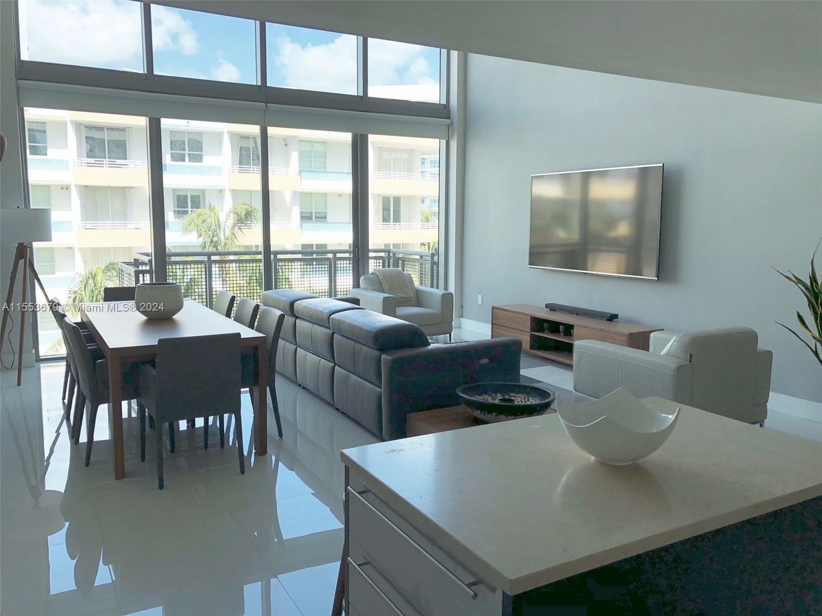 MODERN 3 bedroom 3 bath + den 2000SF loft townhome at Terra Beachside. One of the very few units w/Ocean Views from the master bedroom, 2 assigned garage parking spaces close to elevators. Features 18 ft ceilings, white porcelain floors, top of the line European kitchen & baths, custom closets & blinds. Roof top terrace with summer kitchen & views of the ocean. Amenities include large pool, lifestyle center w/gym, billiards, event & party room. Available for ANNUAL LEASE starting June 1 2024.