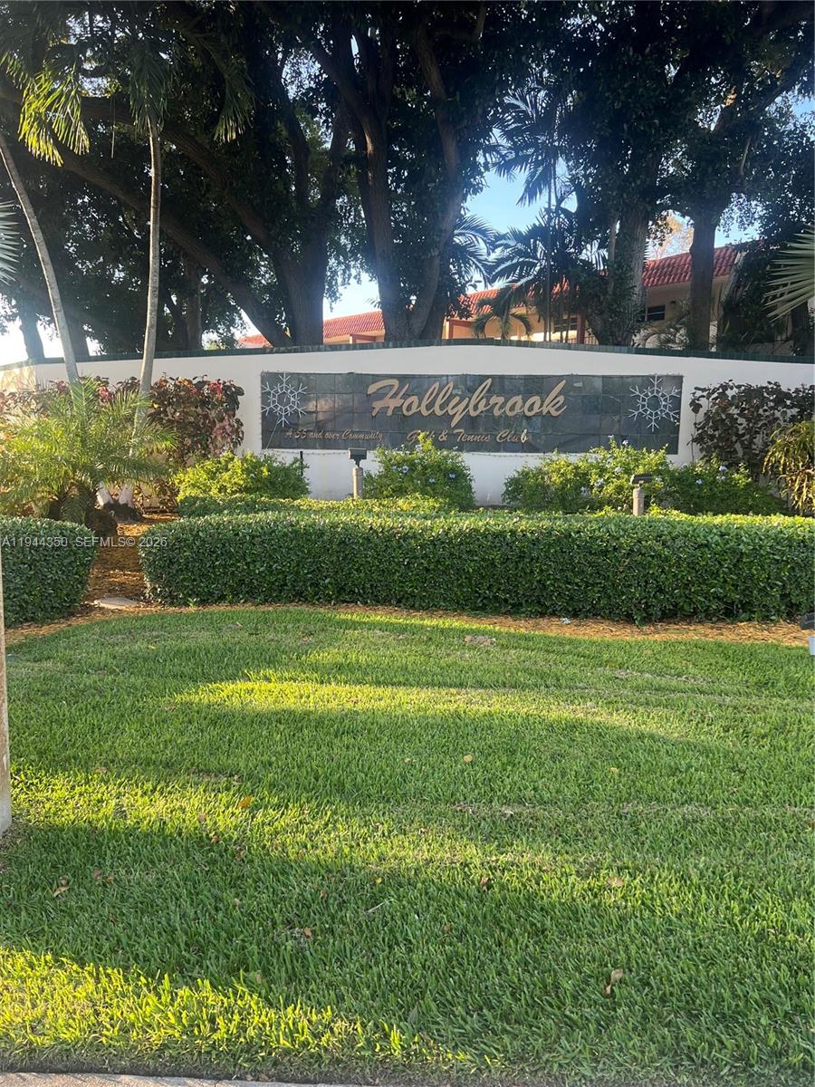 REDUCED! Welcome to Hollybrook Golf and Tennis Club! This 55+ community is resort style living at its best! Two gold courses (Par 3 and PGA) are just steps away from your front door!  Enjoy thye sunsets with pool and golf course views from your spacious balcony. This spacious 1 bedroom 1 1/2 bath unit is fresh and clean with many updates and is ready to be called home! Amenities in this community are unmatched and include, clubhouse, restaurant, fitness center, library, tennis courts, shuffle board, sauna, BBQ area, car wash area EV charging station and so much more! Close to shopping restaurants and only 20 minutes from south Florida's pristine beaches! This is unit is priced to sell and will not last!
