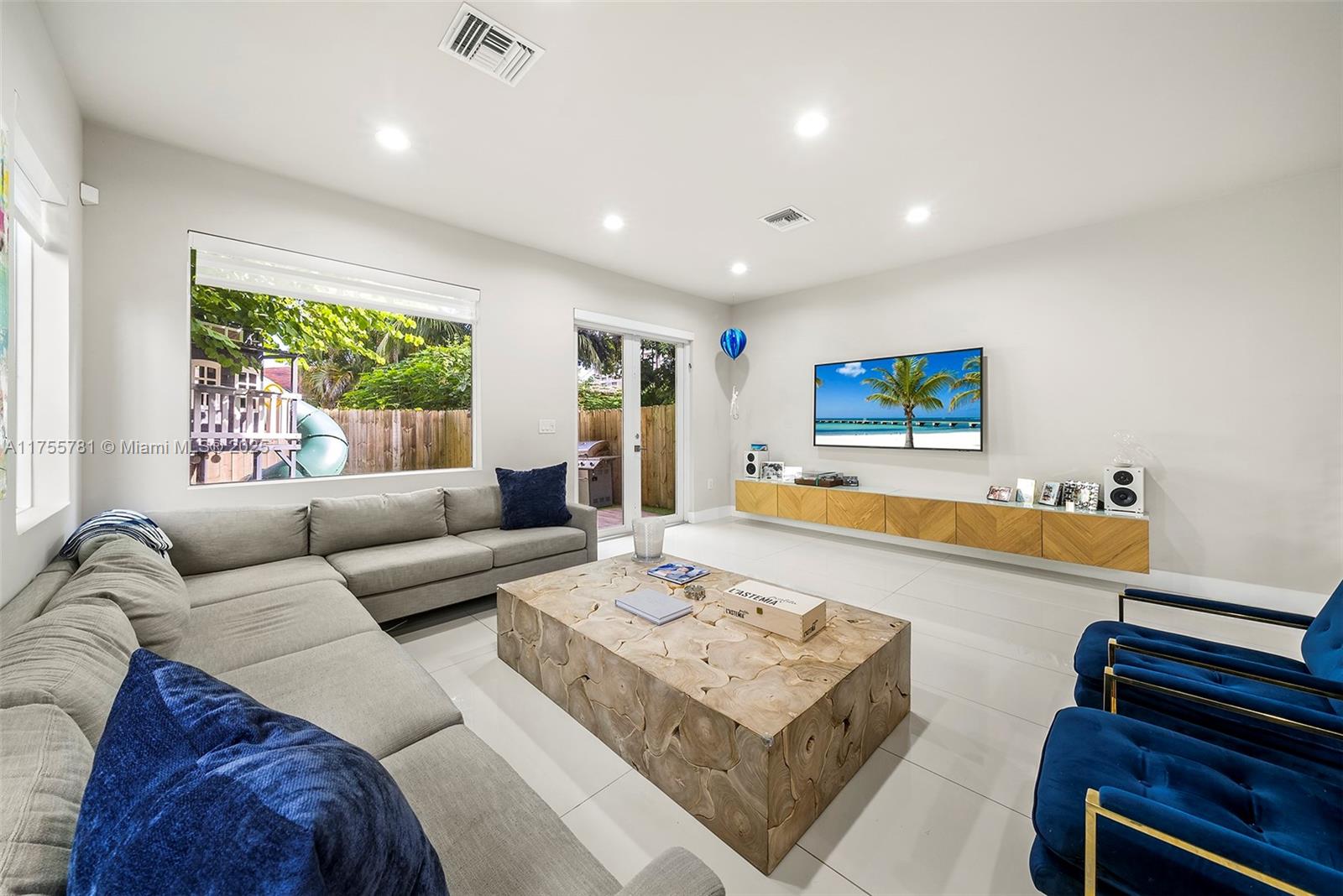 Great location - just half a block from Coral Gables, this new masterpiece blends comfort, style, and convenience seamlessly. If you like craftsmanship and exquisite finishes this is for you! Step inside this true open-concept design, where modern finishes and abundant natural light create an inviting ambiance that flows throughout the home. The chef’s kitchen is a dream with top-tier appliances, sleek countertops, and generous storage—a perfect mix of function and elegance. Each bedroom has a spacious custom walk-in closet and there is a little den, ideal for an office, between the bedrooms. Outside, a tranquil and private yard awaits, perfect for soaking up the Miami sunshine and some play time. A Beautiful Miami Home—tour today and fall in love. Make it Rein!