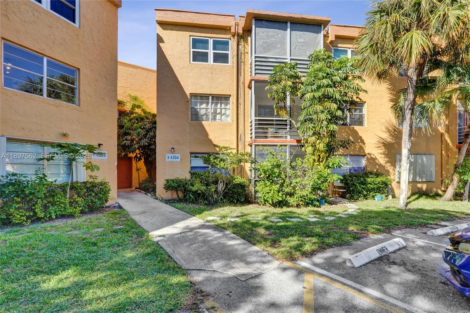 Beautifully upgraded and move-in ready, this modern 2-bedroom, 2-bath condo offers stylish living. Featuring sleek tile flooring throughout, an open layout, and a modern kitchen with granite countertops, custom cabinetry, and new stainless-steel appliances. The primary suite includes a large walk-in closet and a luxurious master bath with a jetted Jacuzzi tub. Both bathrooms are tastefully updated with contemporary finishes. Enjoy the convenience of an in-unit washer and dryer, ample storage, and a private patio ideal for relaxing or entertaining. Located just 15 minutes from the beach, with grocery stores and restaurants within walking distance. Investor-friendly with no rental restrictions—lease immediately! Includes 2 assigned parking spaces, and trucks are allowed.