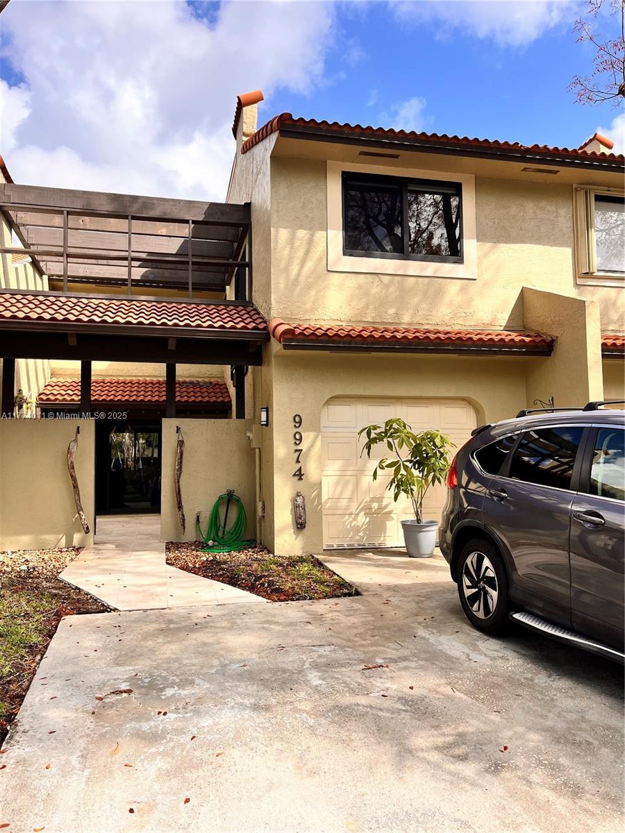 Fully Furnished and remodeled and townhouse in gated Costa del Sol Community in Doral. Surrounded by a golf course, this community offers ample walking and biking spaces, clubhouse, pool, and tennis courts. Tile throughout first floor and real wood on second floor. High Impact Door and Windows, car garage with shelves for storage. Rental includes: Basic Cable, Wi-Fi and water. FULLY FURNISHED