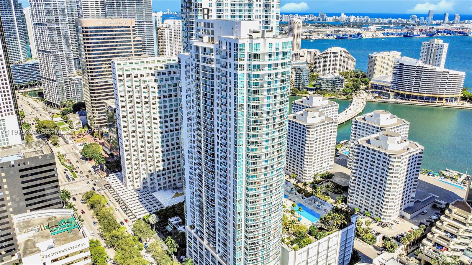 Live the Brickell lifestyle with rare same-floor parking, an expansive balcony, and stunning new floors that immediately set the tone for elevated city living. Bright and spacious, this 2-bedroom, 2-bath residence is filled with natural light from floor-to-ceiling glass and designed with a seamless flow between living, dining, and kitchen spaces. The open layout extends effortlessly to a private balcony that functions as an outdoor living room, perfect for entertaining or unwinding above the city. Both bedrooms feature walk-in closets, a rare advantage in vertical living, while an in-unit washer and dryer add everyday convenience. Ideally positioned in the heart of Brickell, just steps from world-class dining, luxury shopping, nightlife, and minutes from the beaches and Miami International Airport, this residence delivers comfort, functionality, and prime location in one of Miami’s most dynamic neighborhoods.