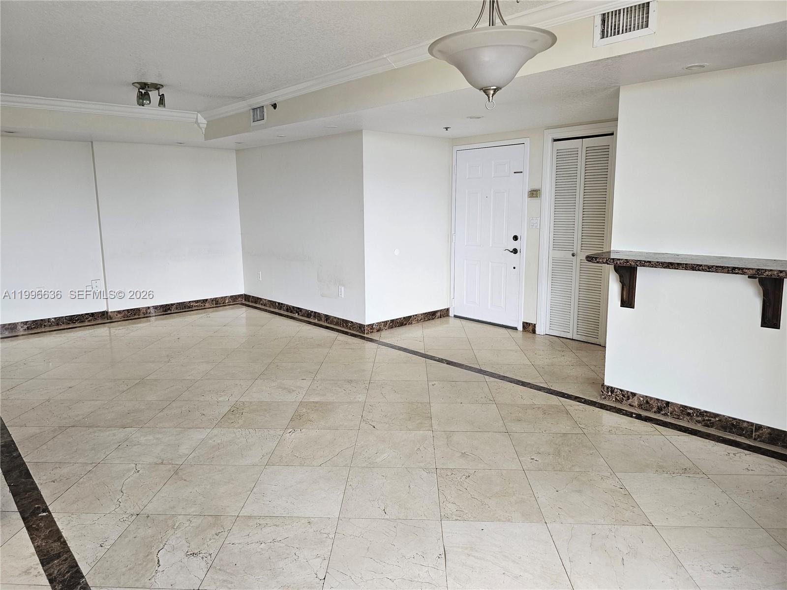 Centrally located 2BR/2BA condo in Coral Way, minutes from Coral Gables, Brickell & Coconut Grove. Spacious layout with marble floors in living areas, hardwood in bedrooms, updated kitchen with granite countertops & brand-new stainless steel appliances. In-unit laundry room with pantry space + washer/dryer. Two private balconies. Secure building with intercom, amenities include billiard room, clubhouse, elevator & fitness room. 2 assigned covered parking spaces. Close to MIA, major expressways, shopping & dining. Motivated seller—bring all offers!