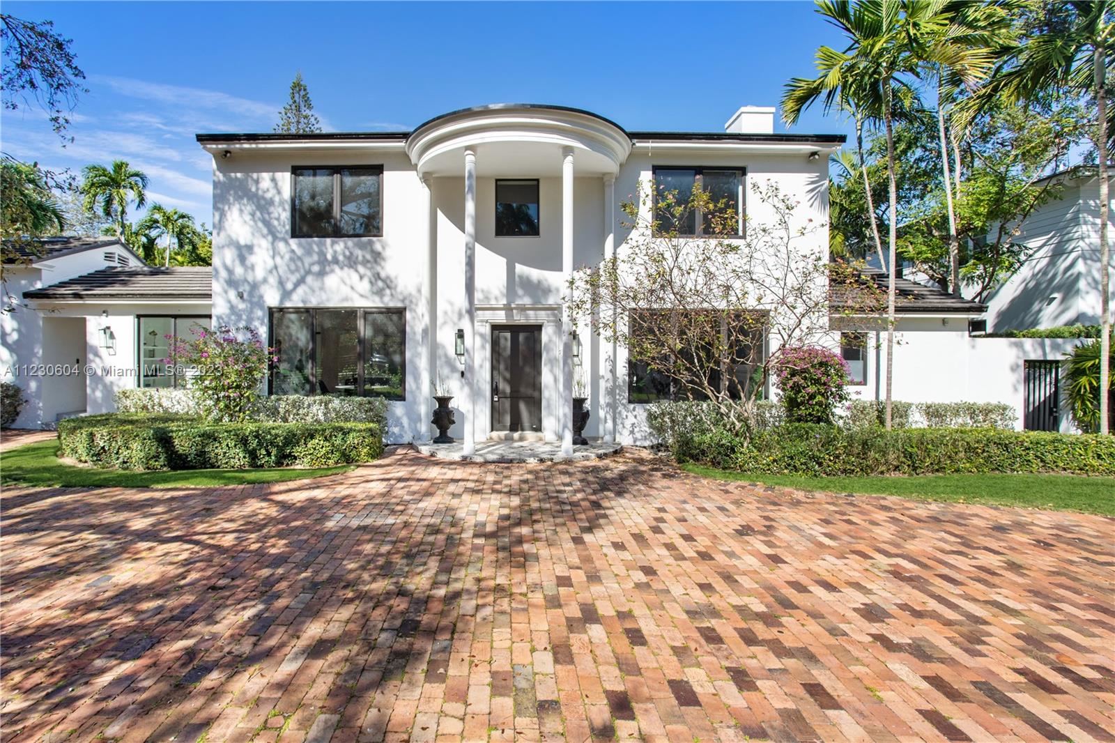 Exclusive North Grove Neighborhood by Vizcaya & Alice Wainwright Park. 1938 Historic residence impeccably renovated in 2020 to modern perfection. 6Bed/5Bath + Powder room, w/2 bedrooms on the 1st floor plus a library & 4 bedrooms on the 2nd floor. Oak wood light grey stained floors throughout living areas & bedrooms, large 24 X 64 Italian porcelain tiles in kitchen, breakfast areas, pool patio & covered exterior terrace. In addition to a formal living with a fireplace & dining area with a mahogany built-in, there is a large family room & a multi-space room all with access to the pool terrace. The kitchen is finished with modern high-end appliances & all white European cabinetry with a breakfast area, as well as a separate enclosed laundry & small office/gym space. A must see!