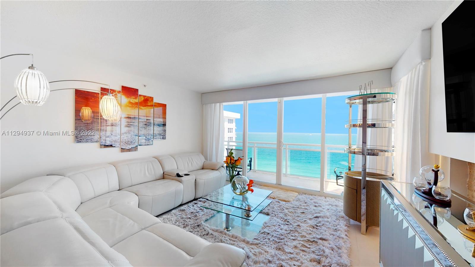 Beautiful bright apartment completely remodeled with direct ocean views in elegant Morris Lapidus building right on the sand ! Large corner unit with open European kitchen with amazing ocean views of the ocean and downtown from the kitchen window . This magnificent 2 bedroom -2 bath unit offers impact glass sliding doors and windows. Updated bathrooms and kitchen with modern furniture to complete your experience at The Collins. The building has valet, doorman, lovely pool, gym, sauna, steam, resident's lounge, front desk 24/7, and party room with pool table. Located in exciting North Beach neighborhood of Miami Beach. Take the with trolley to South beach or walk to local restaurants, shopping and community arts events at the Band Shell. Unit is fully equipped and furnished.