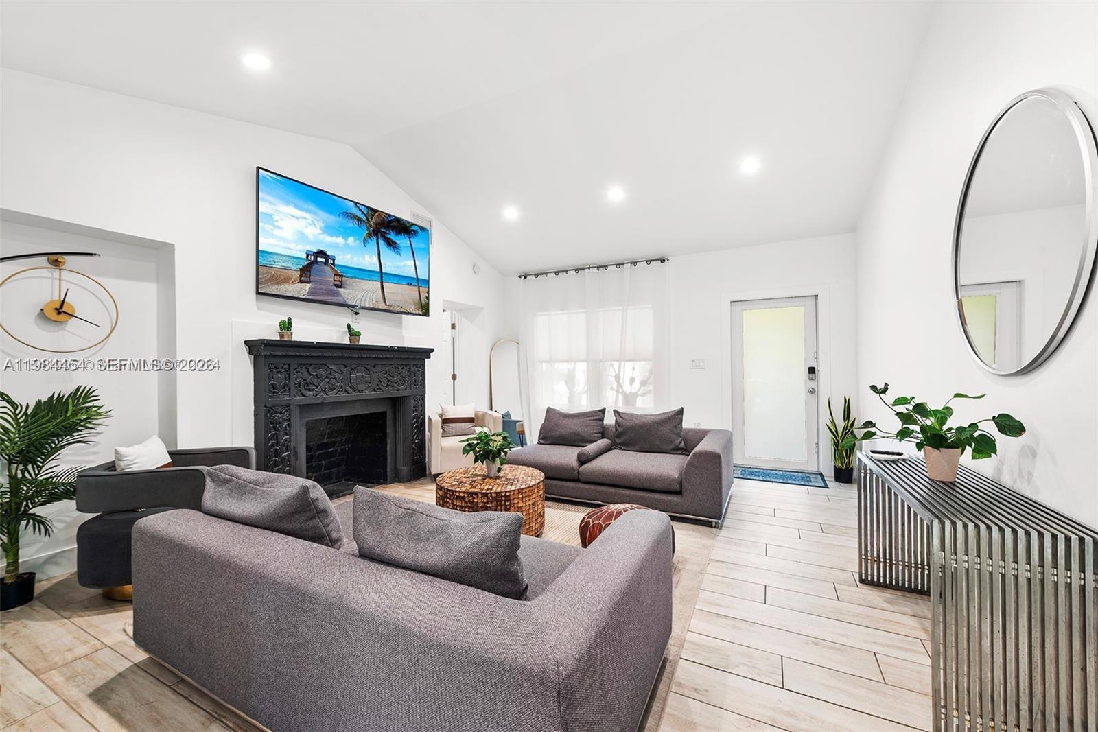 Priced to sell! Beautifully remodeled 5BD/4BA home in one of Miami’s most exciting emerging neighborhoods. No detail was overlooked in the renovation: new plumbing, electrical, roof, and A/C, plus high-impact windows and doors. Enjoy a spacious split-bedroom floor plan with an open, airy layout throughout. Step outside to a lushly landscaped backyard featuring a spacious pool with separate spa features, a covered outdoor dining area in the charming courtyard between the home and pool, perfect for entertaining. Ideally located just minutes to the Miami Design District, Wynwood, and Miami Beach, with convenient access to both major airports. Currently operating as a successful short-term rental. Property includes an electric vehicle charger.