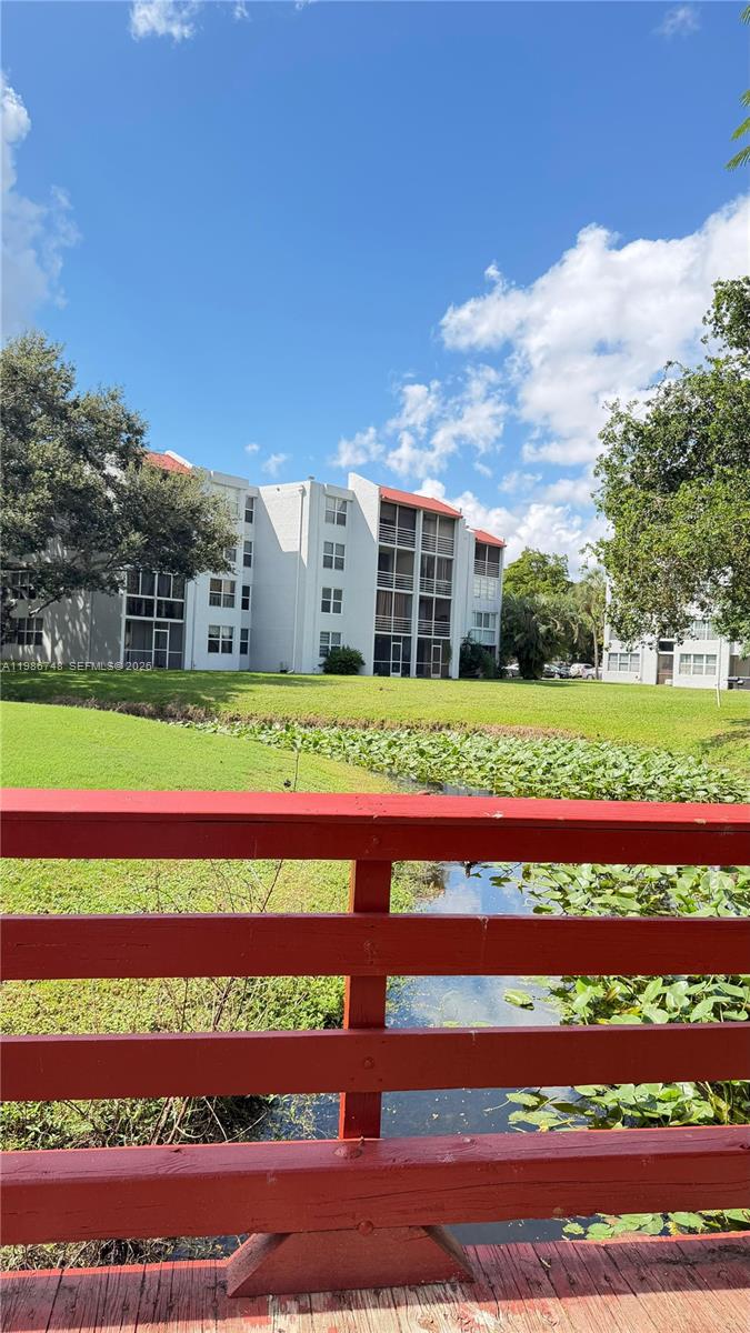 Investor's dream in the heart of Davie! Bright 1/1 condo, 690 SF in desirable Pine Island Ridge. Currently leased through November 2026 — immediate income from day one generating a 5.5%+ cap rate. Resort-style community with pool, fitness center, tennis, golf, 2 restaurants & 24-hr concierge. HOA covers building exterior, landscaping & amenities. Assigned parking. Minutes to NSU, Broward College, I-595 & FLL. Affordable entry point in a high-demand rental market. Don't miss this opportunity!