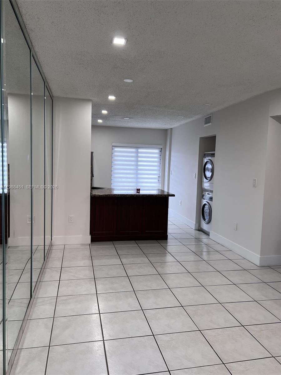 Beautiful 2-bedroom, 2-bathroom condo featuring a granite kitchen with modern finishes and updated bathrooms with upgraded fixtures throughout. This well-maintained unit includes a washer and dryer for added convenience, one assigned parking space, and is located in a building with elevator access. Perfect for comfortable living or investment, in a desirable and centrally located community.