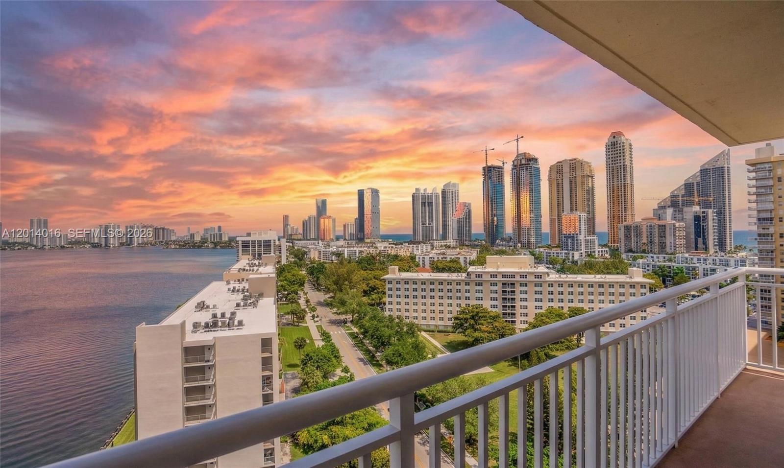 Rarely available "17" line corner residence at Winston Towers 200. Boasting the building’s premier floor plan with 1,544 sq. ft. of interior space, this renovated 2BR/2BA home features a massive wrap-around balcony with breathtaking, unobstructed sunset views over the Intracoastal and skyline.

This residence has total peace of mind with full IMPACT WINDOWS/DOORS and a BRAND NEW HVAC system—upgrades that ensure safety, silence, and significant insurance savings. The interior shines with high-gloss porcelain tile, an updated kitchen with stone counters, and a custom primary walk-in closet.

Enjoy resort amenities: 24-hour security, heated pool, gym, and tennis. Ideally located one block from the beach, parks, A-rated K-8 school, and within walking distance to houses of worship. This turn