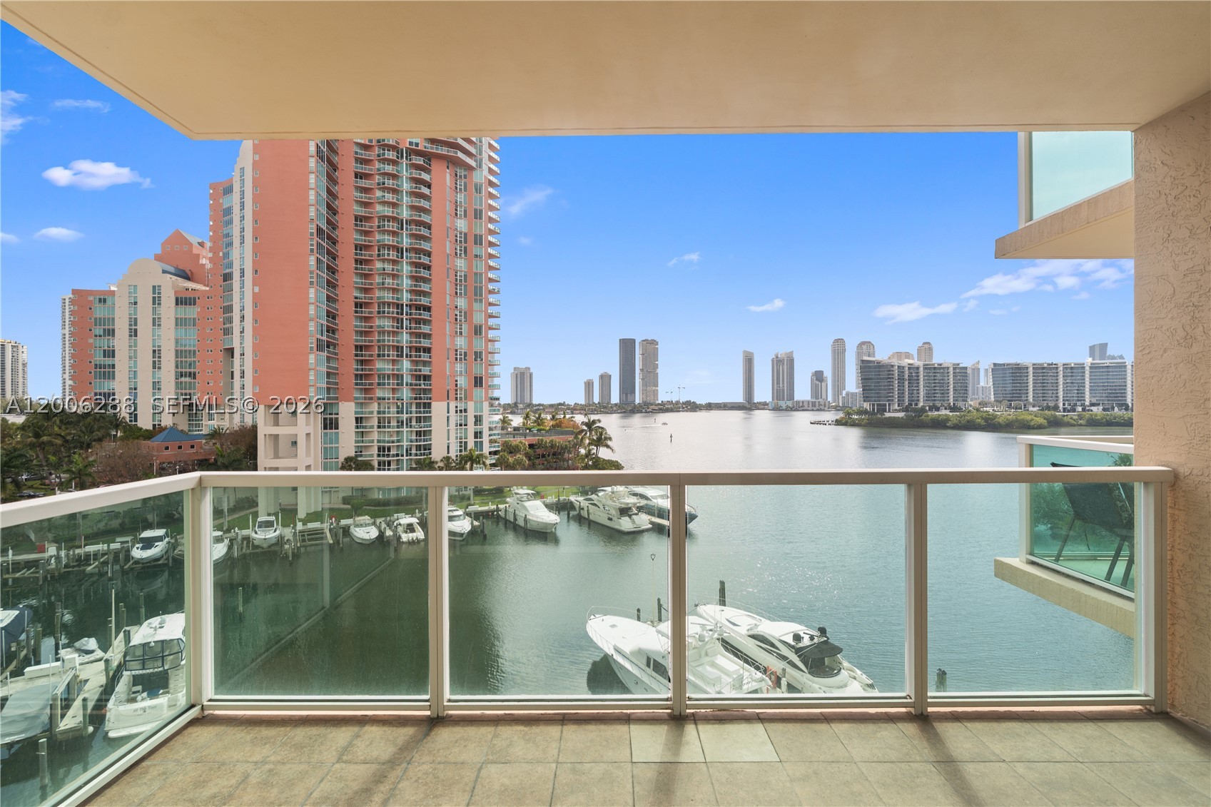 Discover the ultimate in luxury living with this absolutely stunning 2-bedroom plus den, 2.5 bath residence, perfectly situated in the heart of prestigious Aventura. Wake up every morning in your own "home in the sky," greeted by breathtaking, unobstructed panoramic views of the intracoastal, ocean, and marina from every room. This fully furnished, professionally designed, move-in-ready condo is the epitome of sophistication, featuring sleek dark vinyl flooring for a modern and elegant ambiance. The chef’s gourmet kitchen is a culinary dream, showcasing granite countertops, premium stainless-steel appliances, and abundant wood cabinetry for all your storage needs. Retreat to the spacious primary suite and start each day inspired by spectacular water views, creating a serene oasis just for you. Indulge in a truly resort-style lifestyle with access to a state-of-the-art fitness center with sauna and steam rooms, a vibrant clubhouse, multiple sparkling pools, a private marina, an elegant party and billiard room, plus the ultimate convenience of 24-hour valet and security services. This exceptional location puts you within minutes of top-rated A+ schools, beautiful parks, pickleball courts, Houses of Worship, Aventura Arts and Cultural Center, Aventura Mall, and all major highways. Don’t miss this rare opportunity to live in paradise—schedule your private tour today and make this exquisite, spacious condo your new home!