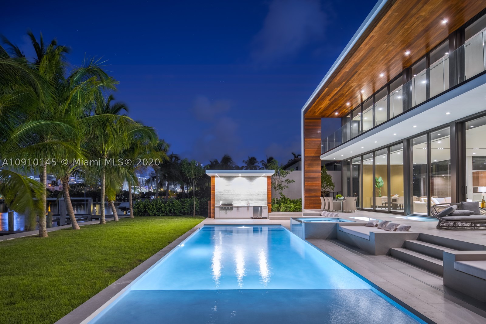 A Modern Waterfront Oasis on exclusive Allison Island. Allison Island Features 49 Waterfront only homes. Contemporary interior finishes along with expansive open living areas and spectacular rooftop terrace. The home features custom Ornare kitchen cabinetry and closets throughout. The ultra-luxurious master suite will not disappoint, featuring oversized his and her closets, master bathroom, sitting area and terrace extending along the entire east side of the house. Additional features include fully automated Lutron System, Roof Top Terrace, 1 elevator, completely furnished by Artefacto, 6 bedrooms plus staff quarters. The detached guest suite may be converted into a fitness studio. 3 car garage and private courtyard entrance along with 75 feet of water frontage.