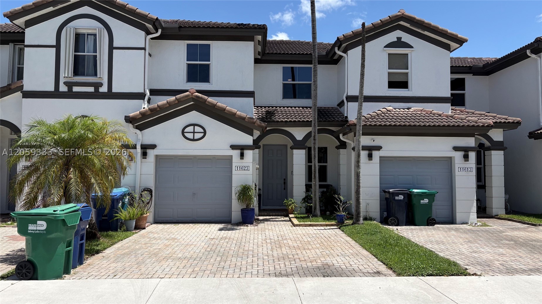 Beautifully Remodeled 1 Car Garage 3/2.5 Townhouse at Windward at the Islands at Doral. Tile and Wood Floors, Gourmet Kitchen, Top of the Line Appliances, Built-Out Walk-In Closets, Washer Dryer, Impact Windows & Doors. Move-In Ready!