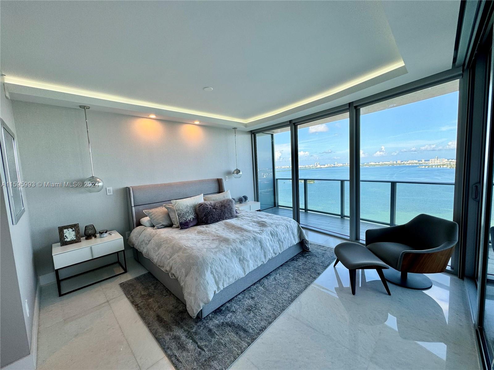 Discover the epitome of luxury living in this stunning 3-bedroom, 4-bathroom south corner unit at Aria on the Bay. This unique residence features unobstructed views of the bay and ocean from the expansive wrap-around balcony.

Aria on the Bay offers an array of top-tier amenities, including two pools, a hot tub, BBQ area, state-of-the-art gym, sauna, steam room, kids' playroom, theater room, and a spacious event room. Situated in close proximity to the opera, ballet, Heat games and concerts, Miami art museum, science museum, parks, renowned restaurants, trendy shops, and vibrant entertainment options, this unit promises an unparalleled lifestyle experience. Fully furnished! No pets.