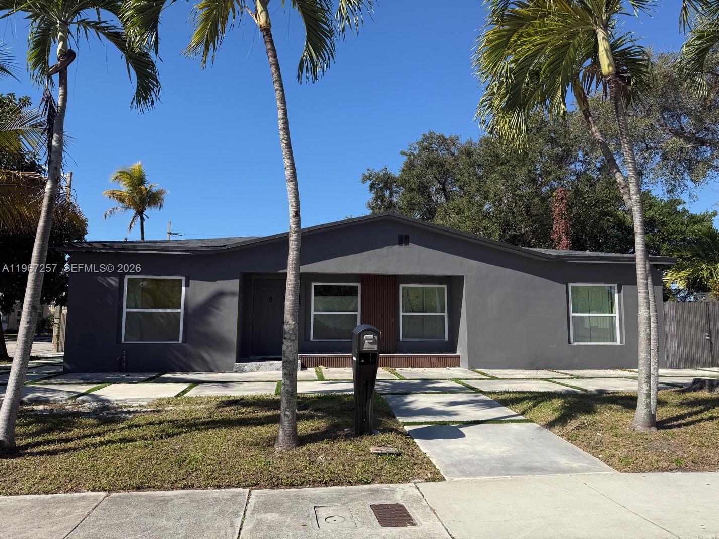 Beautifully updated corner-lot home offering the perfect blend of comfort, flexibility, and investment potential.
The main residence features 3 spacious bedrooms and 2 modern bathrooms plus a private 1-bedroom, 1-bath efficiency ideal for extended family, guests, or additional rental income. Fully remodeled with elegant porcelain tile flooring throughout, updated kitchen with stainless steel appliances, renovated bathrooms, modern lighting, updated electrical system, new fencing, and blinds. Zoned Duplex providing excellent future development or income-producing opportunities and includes a storage shed. Prime location near major highways, Wynwood, and the Design District with convenient access to schools, dining, shopping, and entertainment. Move-in ready with great versatility and upside potential  perfect for homeowners and investors alike.