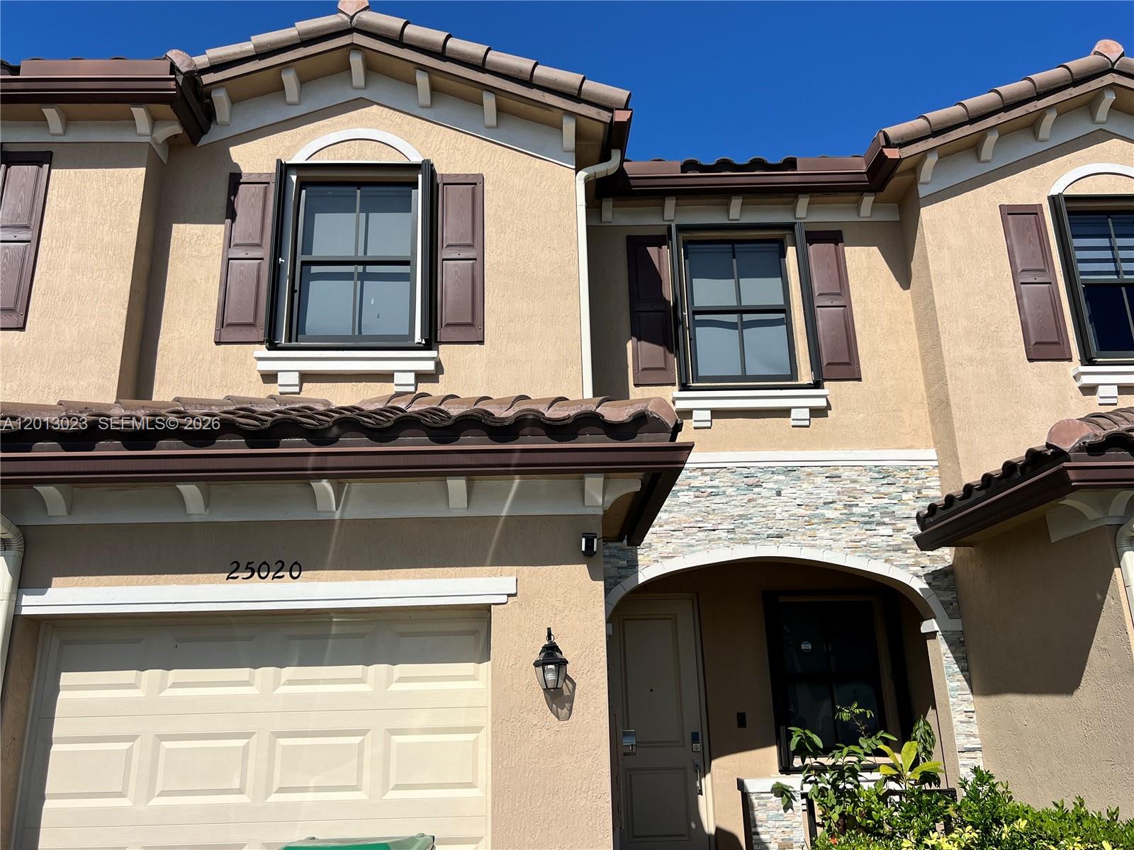 3 bedrooms 2.5 bathrooms townhouse in Isola. This 2019 home in Homestead offers a comfortable living in a gated community with resort-style amenities. The main level features open-concept living and dining, plus a well-equipped kitchen. Upstairs, the spacious primary suite includes a walk-in closet, with two additional bedrooms and a full bath. laundry space on the upper level.Garage and guest parking, private patio or backyard space. The Isola community features a clubhouse, fitness center, sparkling pool, dog park, business center, and central mail hub. Low HOA at $240 per month covers exterior maintenance and common areas, this townhome is a great fit for first-time buyers or investors looking for a newer construction option with strong community features. Conveniently located just behind Wawa, Chick-fil-A, and Aldi on SW 248th Street, with easy access to the Turnpike and Black Point Marina. Schedule showings via ShowingTime.Owner occupied, please 24 hours in advance. Seller will require a 10 days post occupancy period after closing.