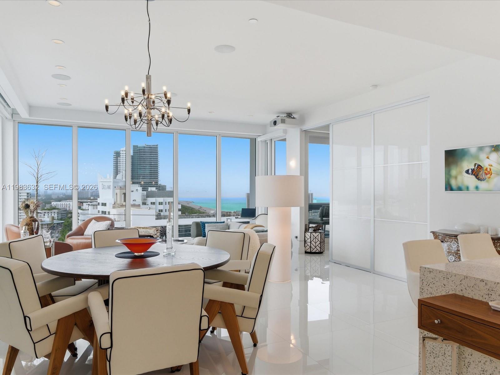 Rarely available NW corner penthouse at Decoplage, the only oceanfront condominium located directly on Lincoln Road. This fully furnished 2BD/2BA residence offers approximately 1,495 SF with panoramic views of the Atlantic Ocean, Biscayne Bay, and the Miami skyline. The open living and dining areas flow seamlessly to an oversized balcony spanning the entire residence, accessible from the living room and both bedrooms, offering sweeping ocean, bay, and city views.

Residence features include white porcelain flooring, built-in drop-down movie screen, surround sound system, TVs throughout, and in-unit washer and dryer. Offered fully furnished with designer pieces, this is an ideal turnkey residence for full-time living, seasonal use, or investment.

Decoplage is a full-service oceanfront building with direct beach access, oceanfront pool, fitness center, 24-hour attended lobby, and 30-day minimum rentals allowed. Prime South Beach location near world-renowned Lincoln Road dining, shopping, and entertainment. Building improvements include a new porte-cochère entrance, renovated hallways, and ongoing common-area upgrades.

~$90,000 special assessment has been completely paid off!