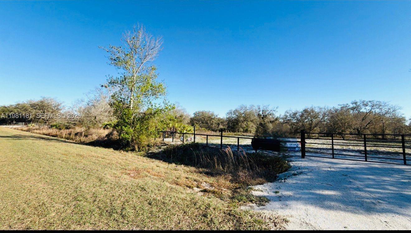 Escape to your own 1.25-acre retreat in Viking Estates, an adventurer’s paradise with endless possibilities! This property offers the perfect spot to build your dream country home, ranch, or weekend getaway—without the hassle of an HOA. With easy access, you can enjoy privacy while still being close to modern conveniences. For outdoor enthusiasts and nature lovers, the property is located just north of the breathtaking 54,000-acre Kissimmee Prairie State Park, where over 100 miles of scenic trails await for horseback riding, fishing, hiking, and cycling. The lot is cleared and fully fenced all around, offering added privacy and making it easier to start building or planning your future project. An additional adjoining lot is also available, giving you the opportunity to own a total of 2.5 acres for even more space and potential. Whether you're looking for a personal retreat, an investment opportunity, or a future homestead, this property offers incredible possibilities. Contact the county to explore zoning options and land use opportunities.