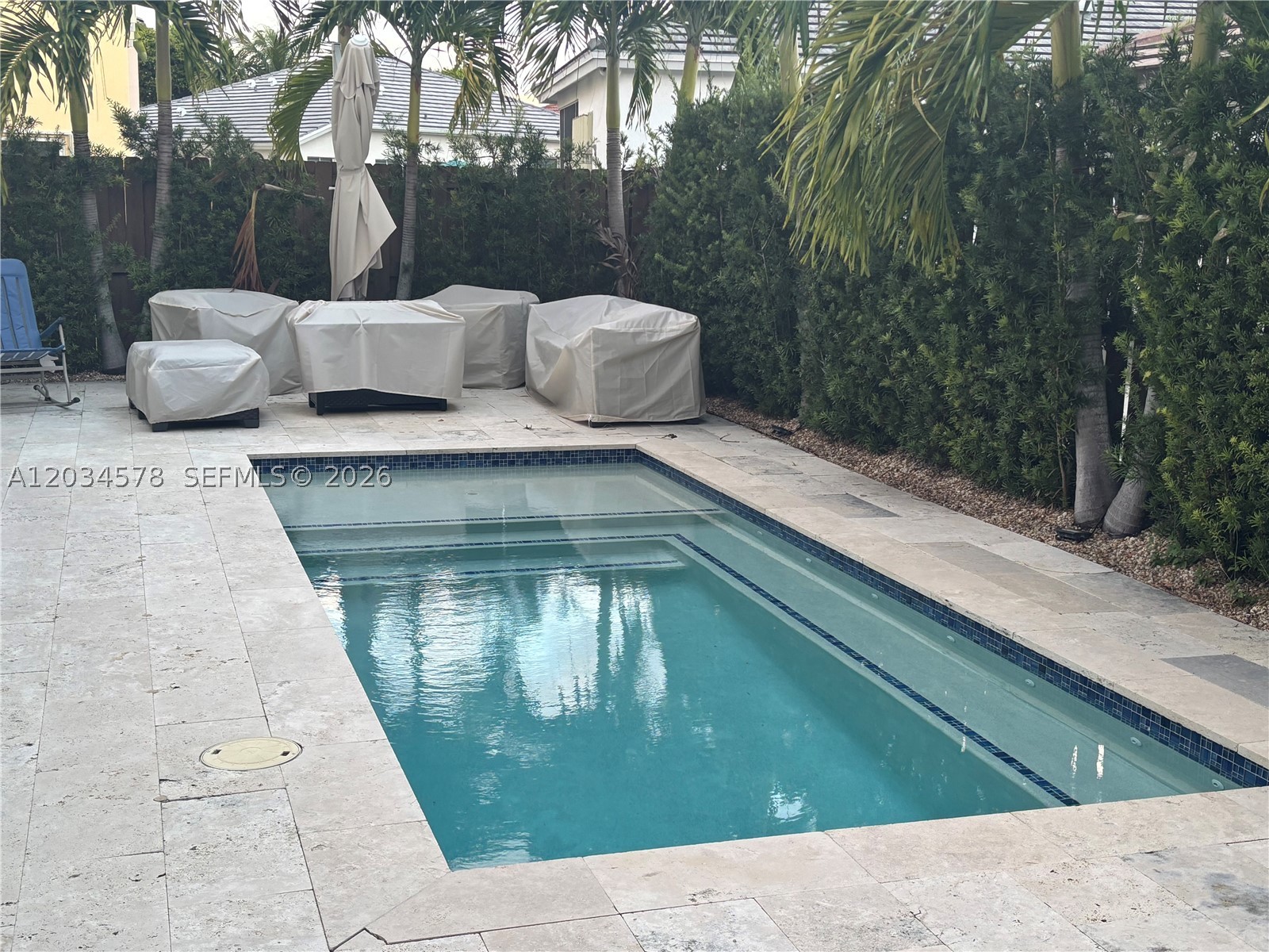 Gorgeous 3-bedroom, 3-bathroom pool home in prime Kendall location! Designed for style and functionality, it features soaring ceilings, sunlit living spaces, and an open layout perfect for entertaining. The gourmet kitchen showcases quartz countertops, premium stainless-steel appliances, new impact windows & doors. In-Law Quarters! Step outside to your private pool, ideal for relaxing or hosting gatherings. Conveniently located near top-rated schools, shops, and fine dining. This residence offers the ultimate blend of comfort and convenience. The property is presently being used as a 2/2 in the main house and 2/1 in the in-laws. The 3rd bedroom can be easily added to the house, and leave the garage converted as another bedroom, office space, or storage space.