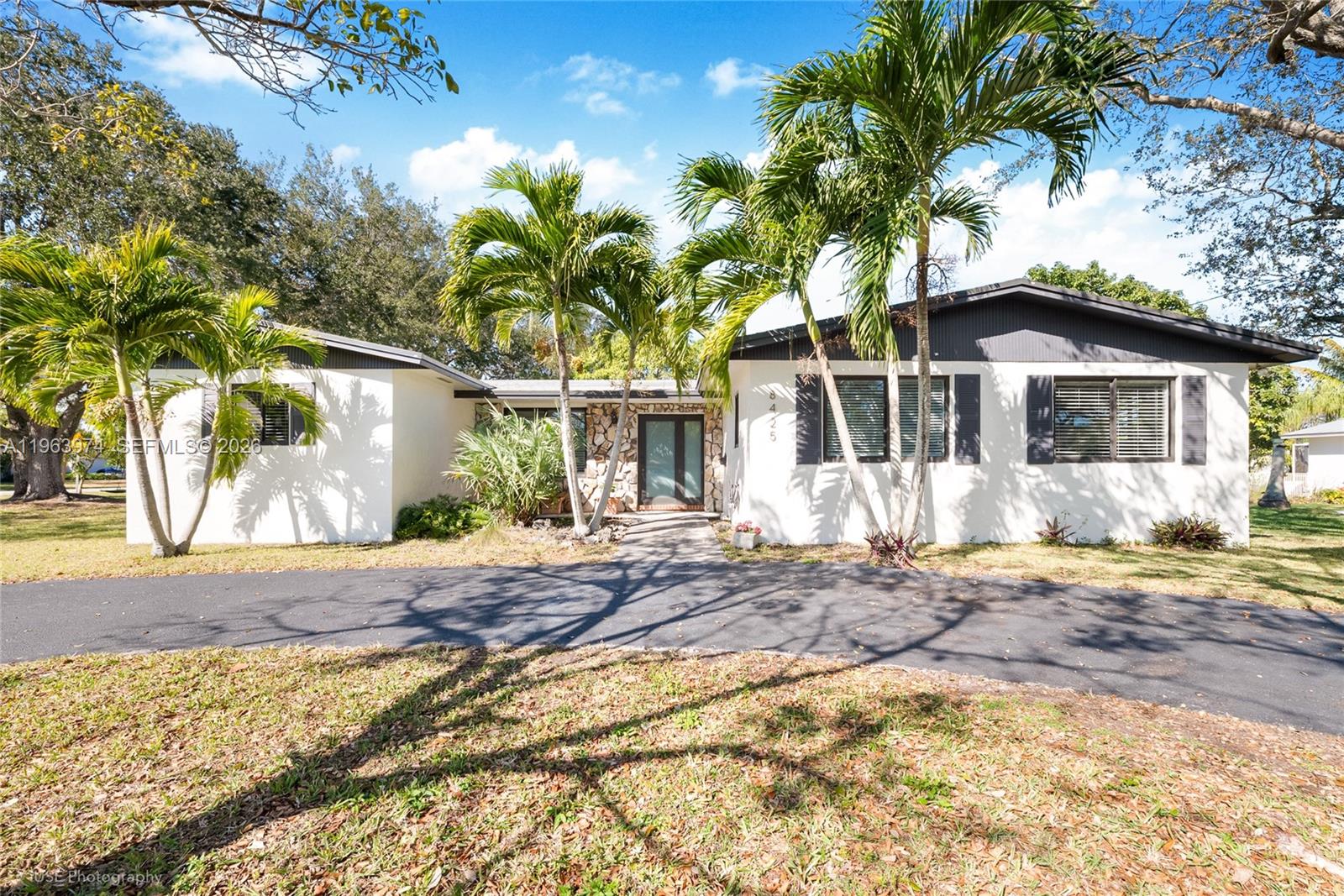 This peaceful Palmetto Bay 4/3 home sits on an oversized corner lot with a bright, open layout and a huge screened porch for indoor-outdoor living. Live worry free with low insurance: high-impact windows & doors (2022), new roof (2025), new plumbing (2020), new electrical panel (2020), new water heater (2025), new washer/dryer (2025), plus a whole-home water purification system and a brand-new permitted full bathroom. Minutes to Coral Reef Park, Deering Estate and one of the top, most sought-after school districts. Extra touch, lovely neighbors!